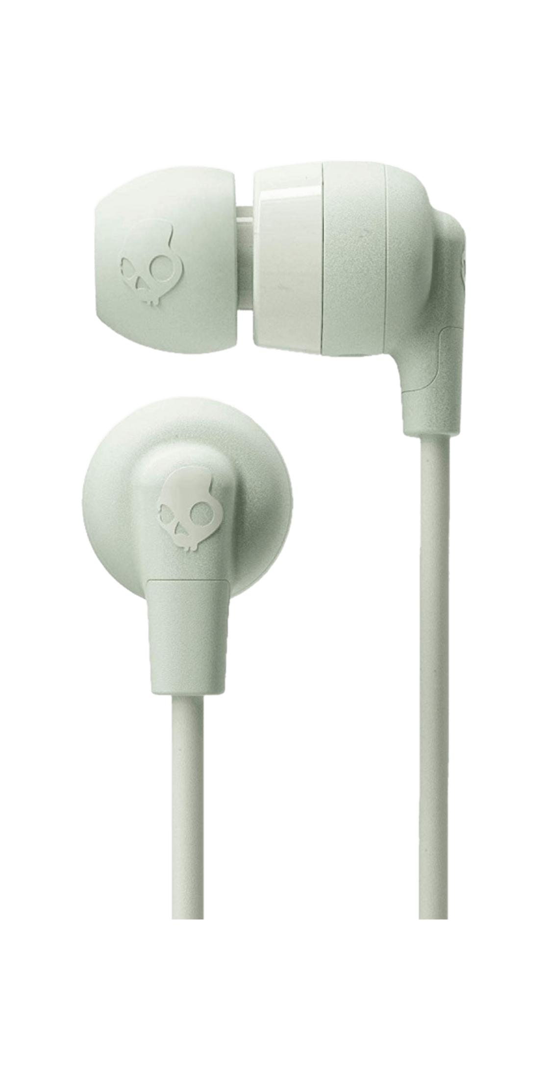 Dwa jasnozielone słuchawki douszne z logo czaszki.
