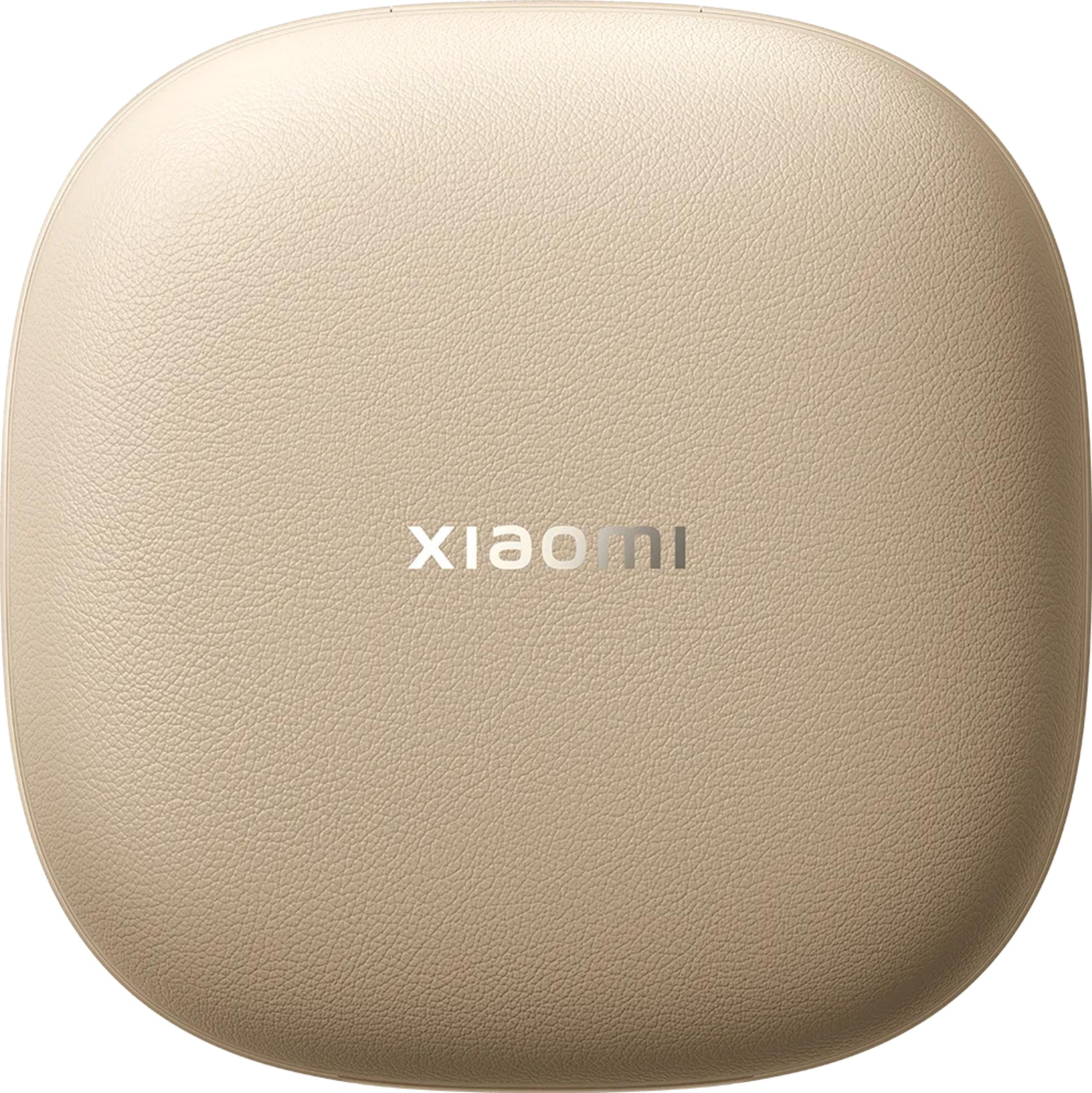Beżowe etui ładujące Xiaomi, lekko teksturowane, z srebrnym logo.