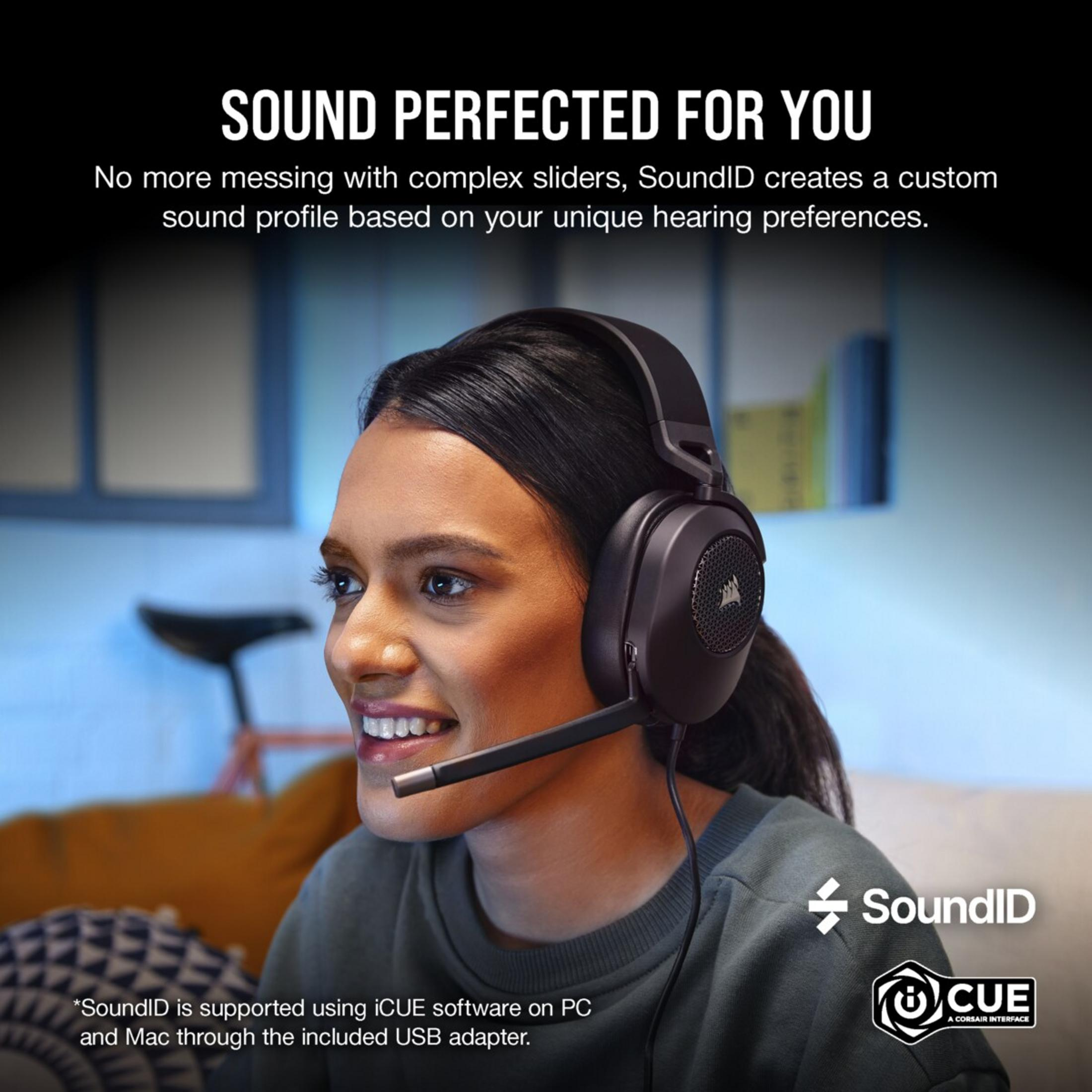 Kobieta w czarnych słuchawkach z mikrofonem, uśmiecha się. Tekst: Sound Perfected For You.