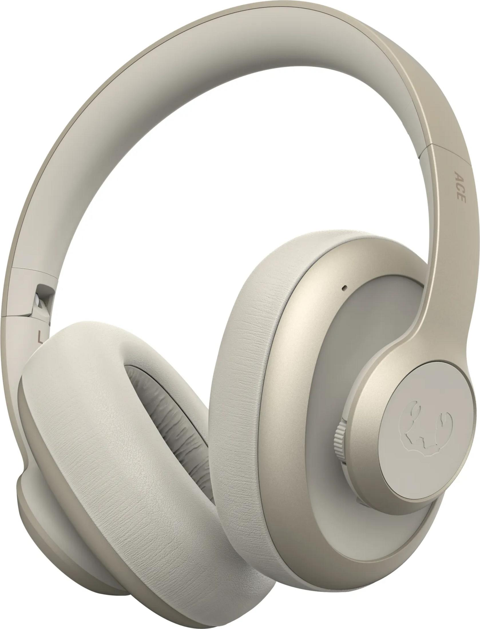 Un casque beige avec des oreillettes et un serre-tête, sur fond blanc.