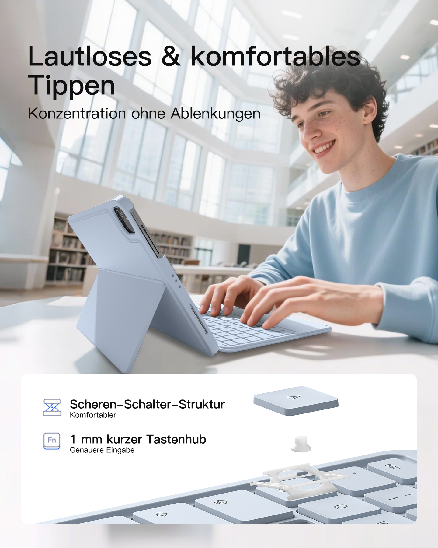 Mann tippt auf hellblauem Tablet mit Tastatur in hellem Raum.