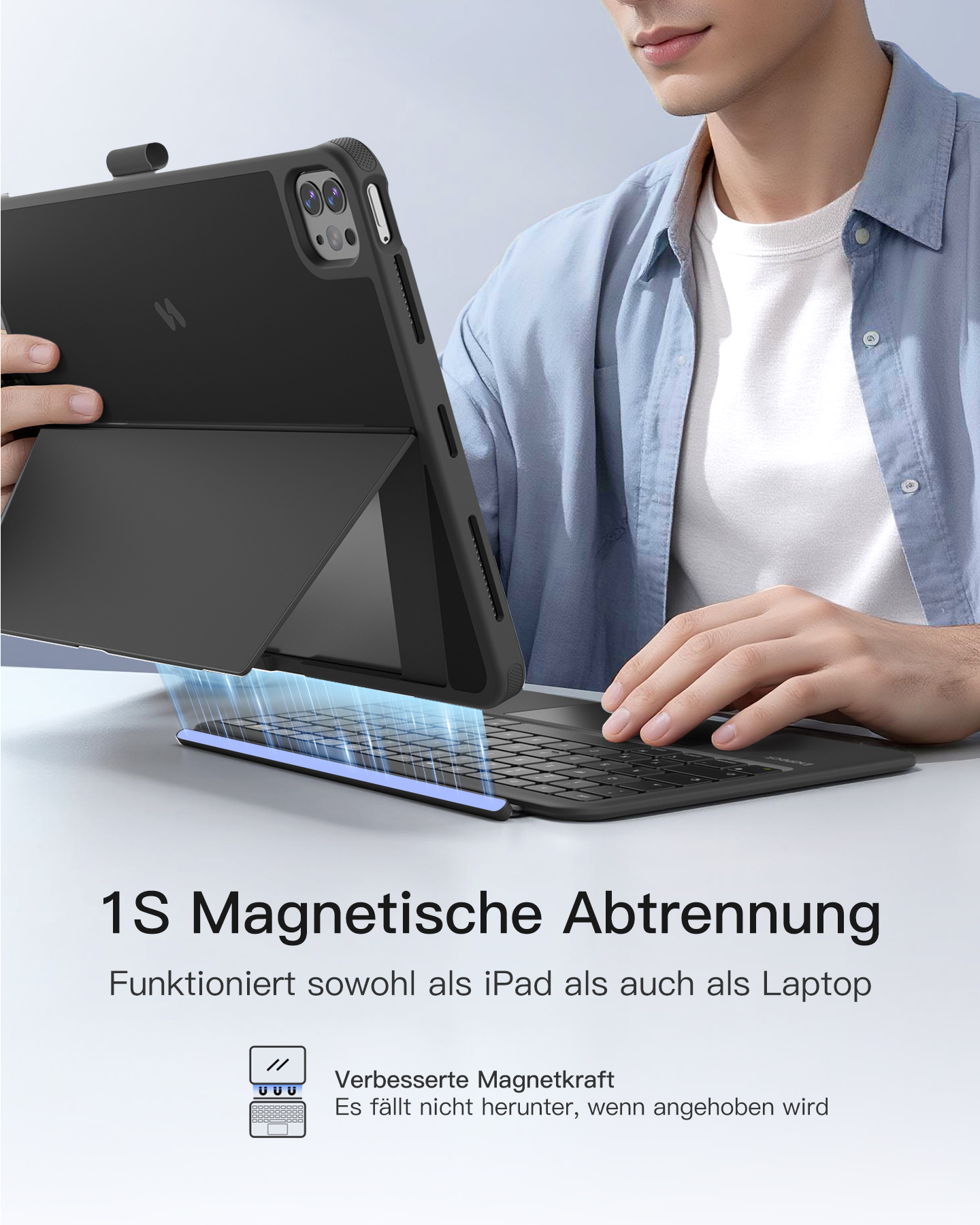 Mann zeigt schwarzes iPad mit Tastatur. "1S Magnetische Abtrennung"