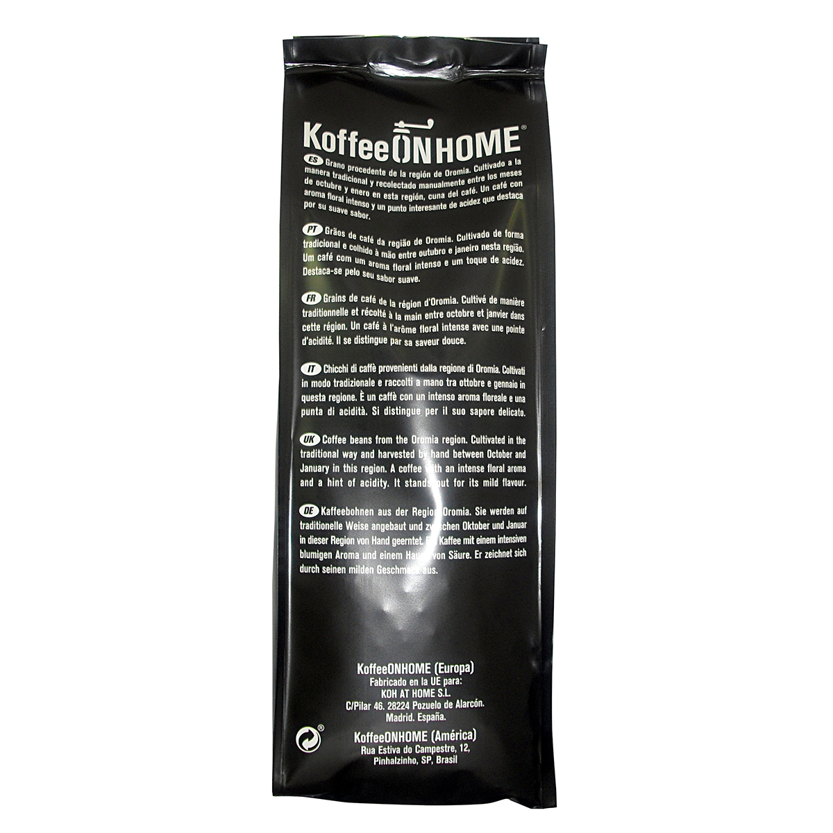 Bolsa de café con descripciones de producto multilingües y datos de dirección.