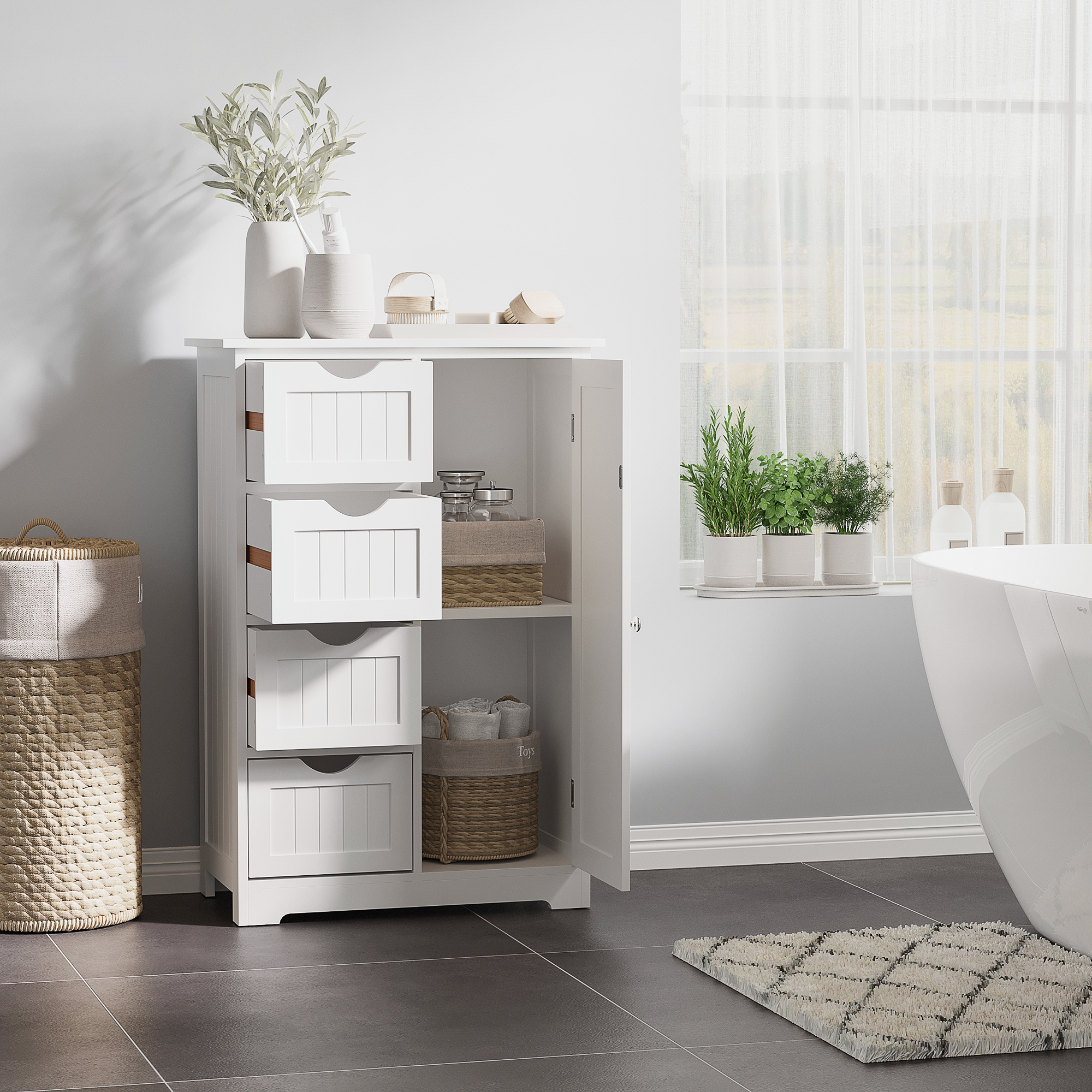Un mueble de baño blanco con cuatro cajones, al lado una cesta. Plantas y botellas en un alféizar.