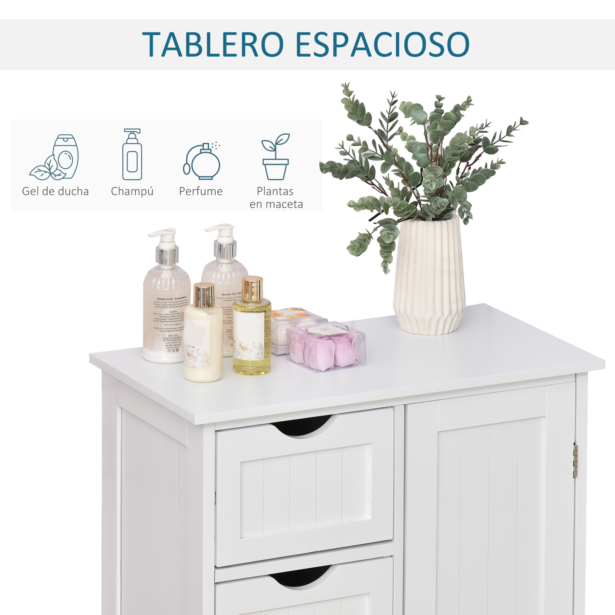 Un mueble blanco con botellas, jabón y un jarrón con ramas.