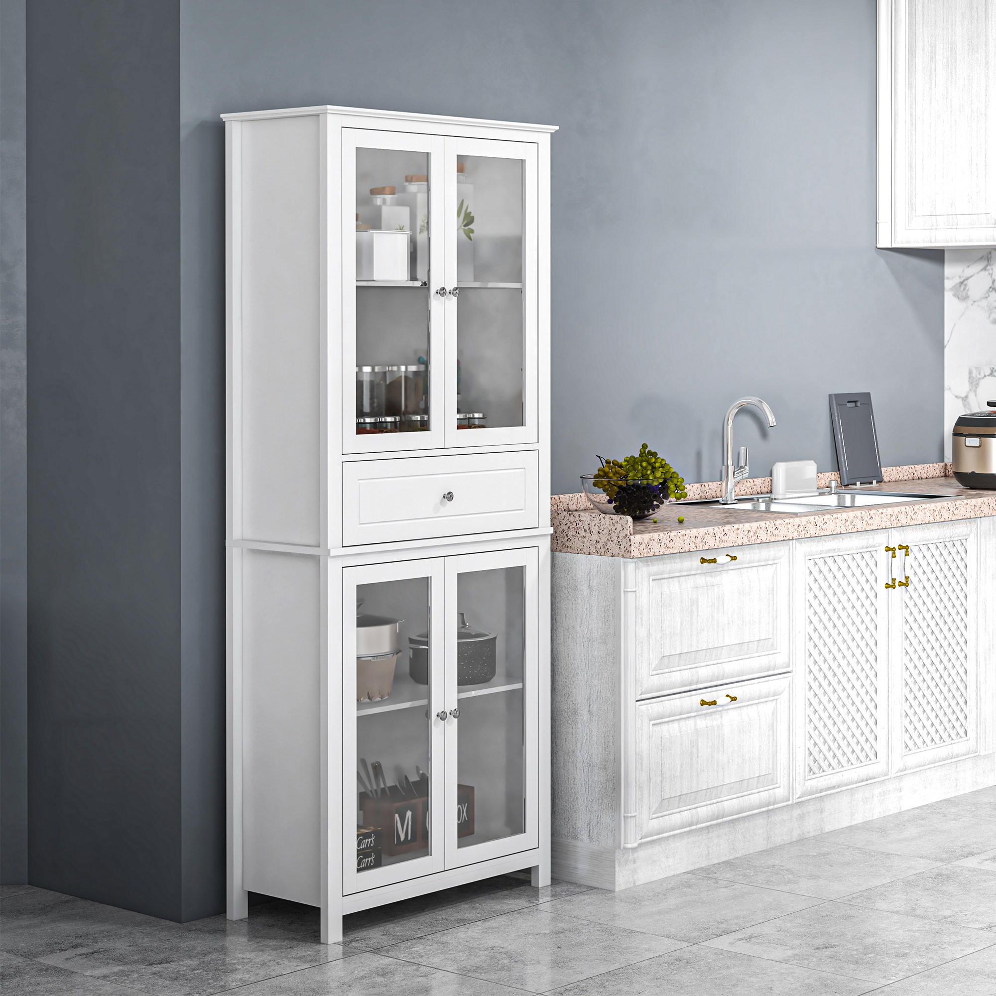 Un armario de cocina blanco con puertas de cristal junto a una encimera con fregadero.