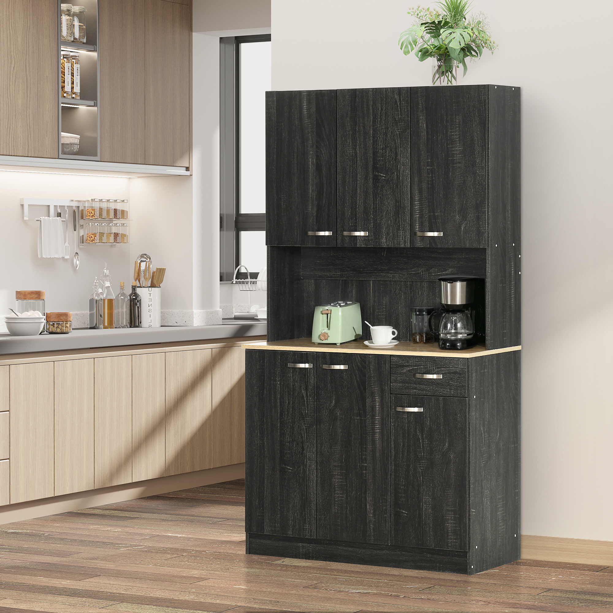 Aparador de cocina gris oscuro con vetas de madera, cafetera, tostadora y plantas.
