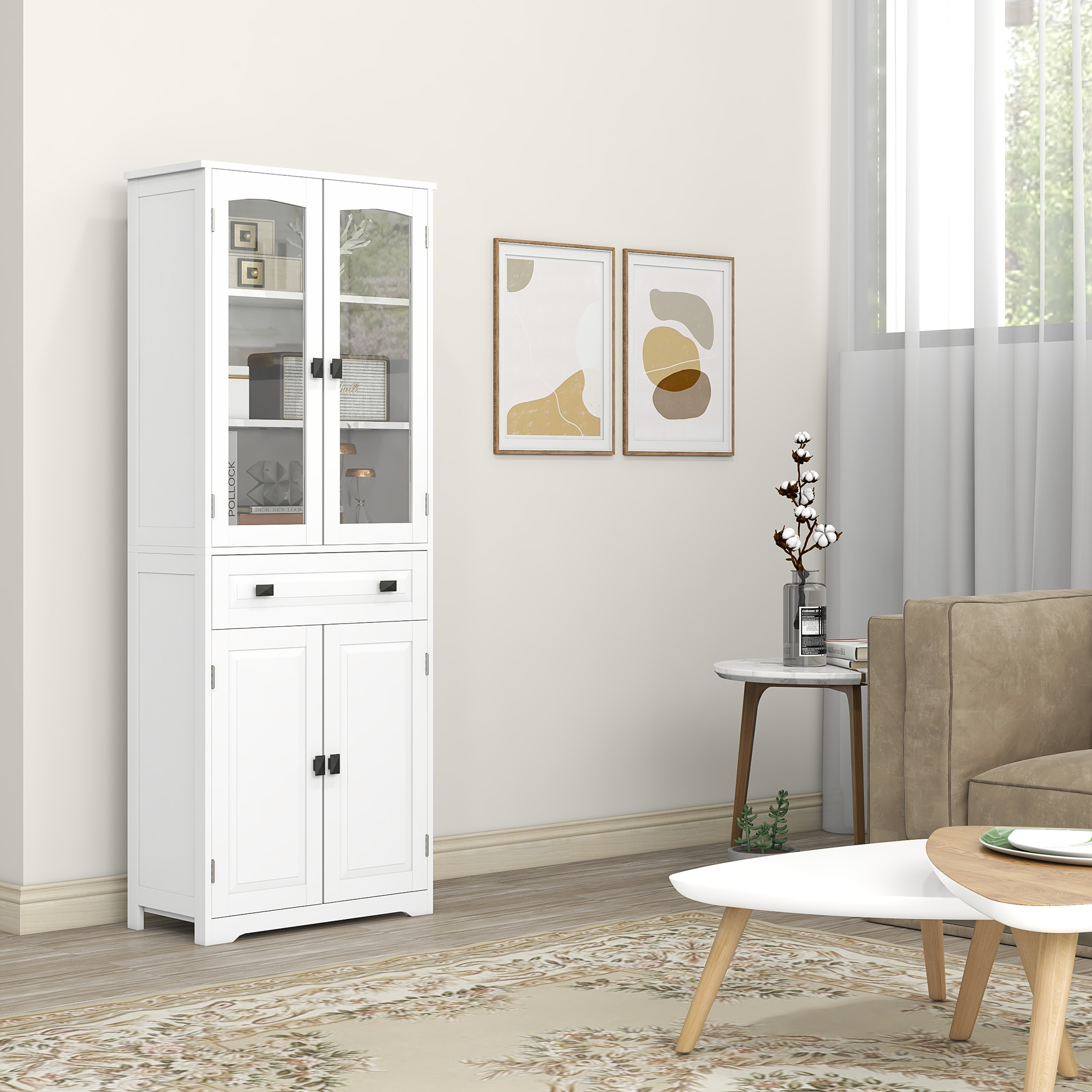 Un armario blanco con puertas de cristal junto a un sofá, con cuadros y plantas.