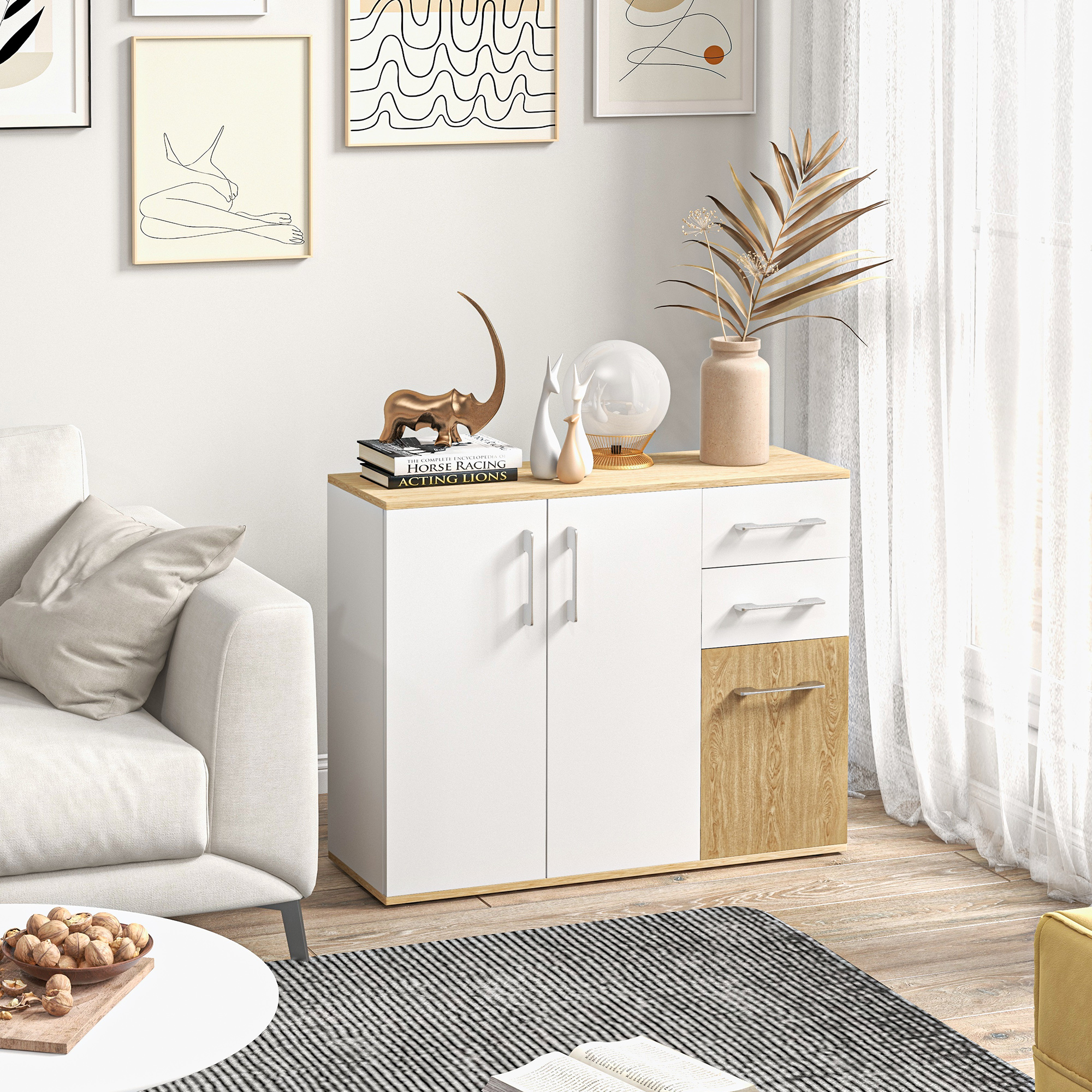 Un mueble moderno con puertas blancas y cajones de madera, decorado con esculturas.