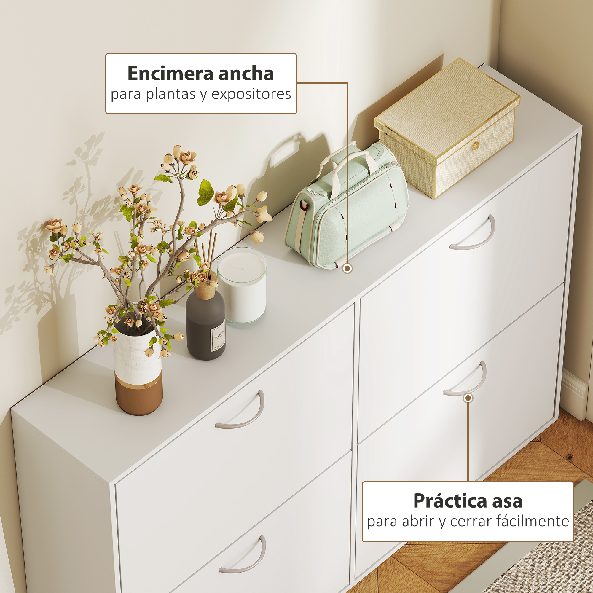 Cómoda blanca con plantas, bolso, caja y vela. Asas prácticas.