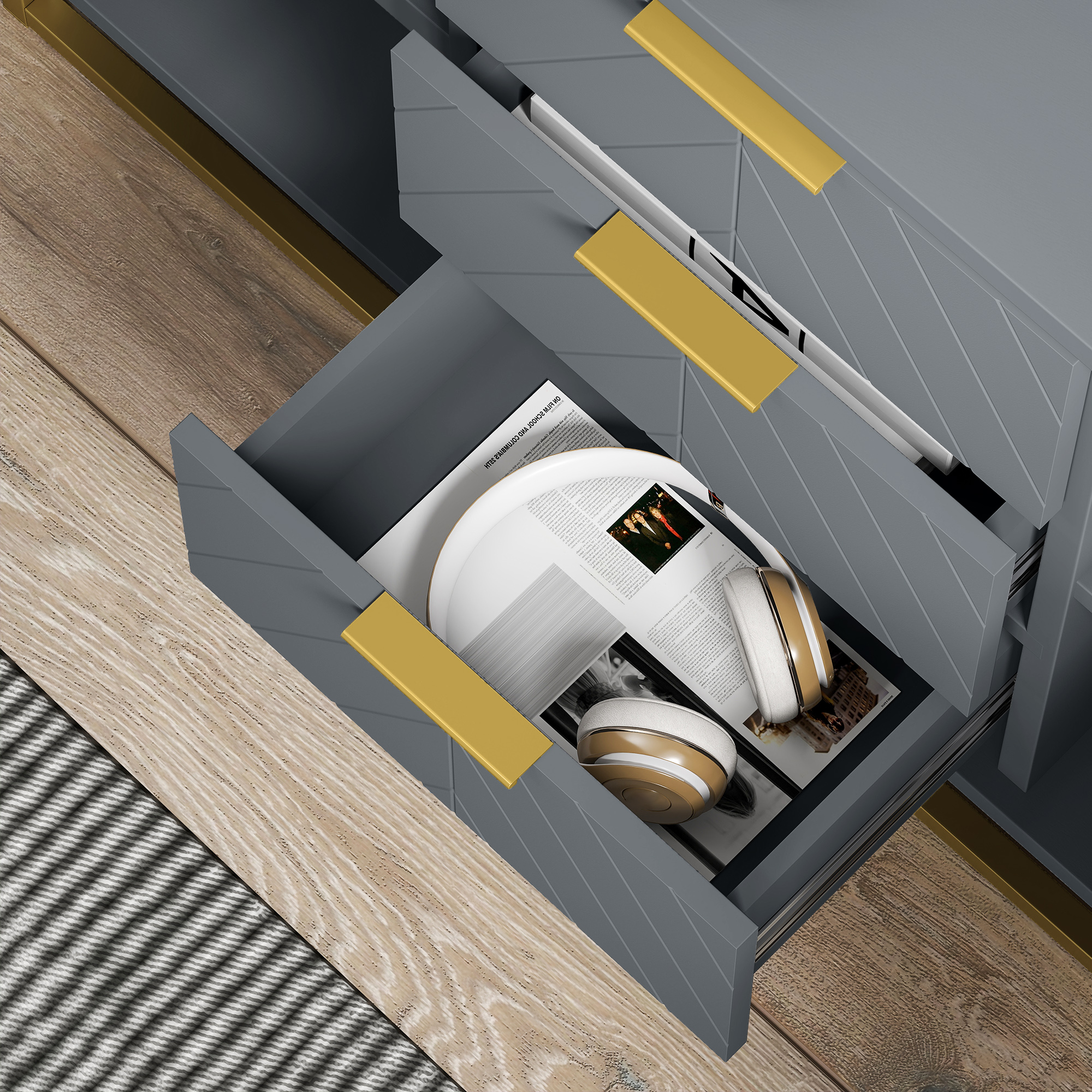 Gabinete gris con cajón abierto, auriculares y revistas sobre suelo de madera.