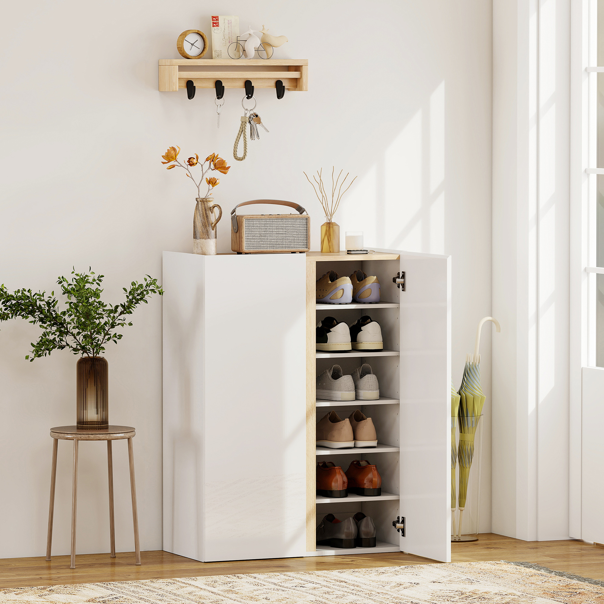Un zapatero blanco con puertas abiertas, lleno de zapatos.