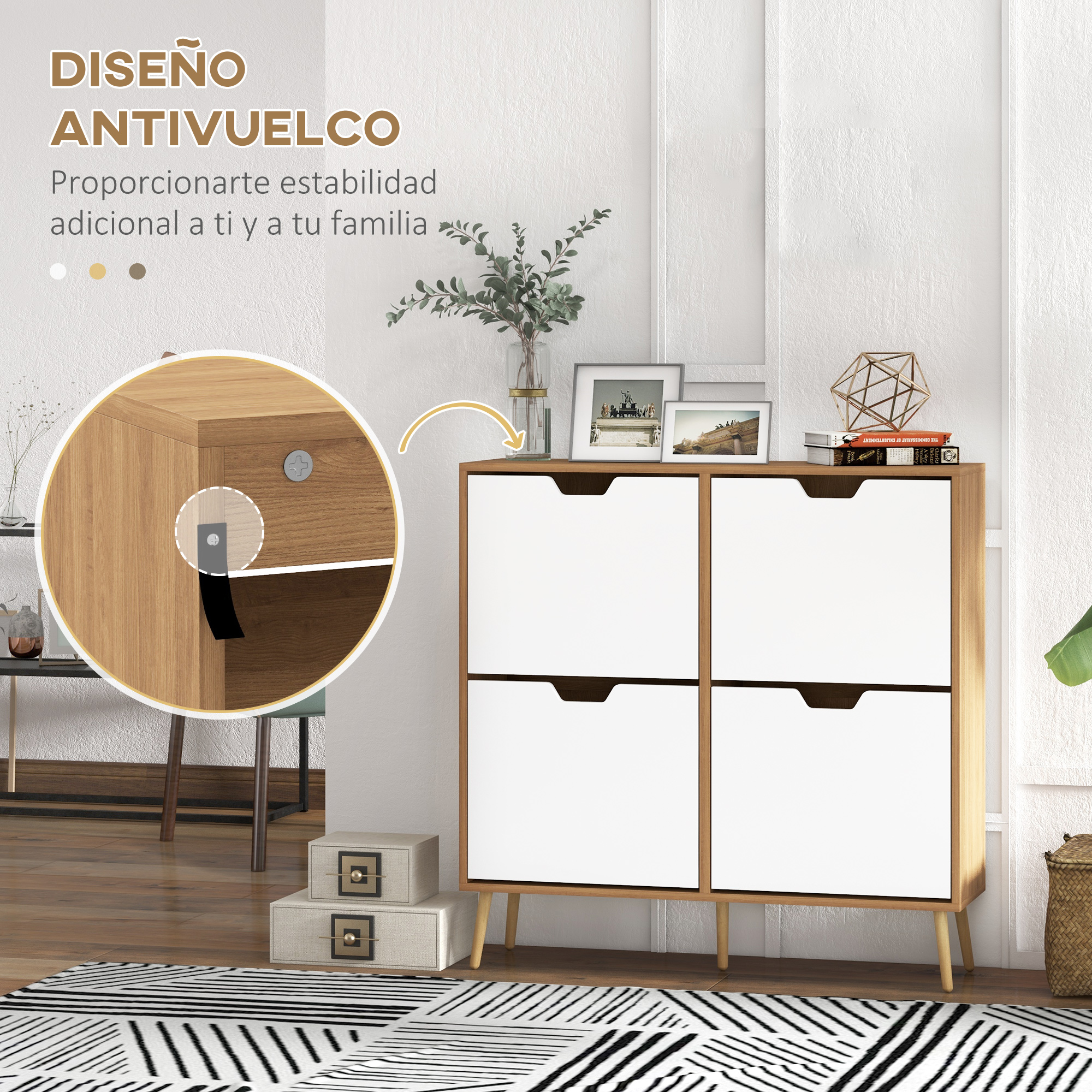 Un mueble blanco con marco de madera y cuatro cajones, decorado con fotos y plantas.