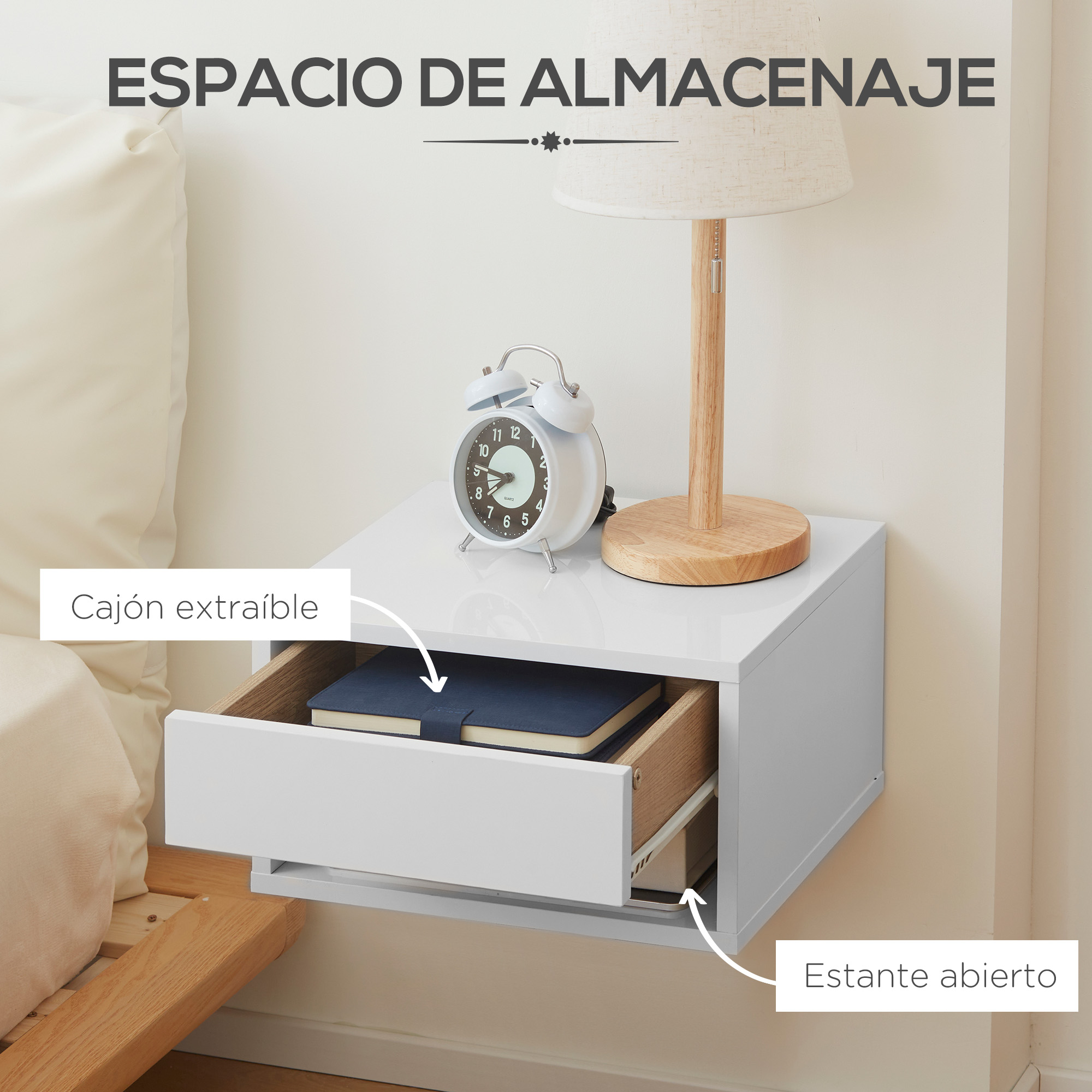 Mesita de noche blanca con cajón abierto, despertador, libro y lámpara.