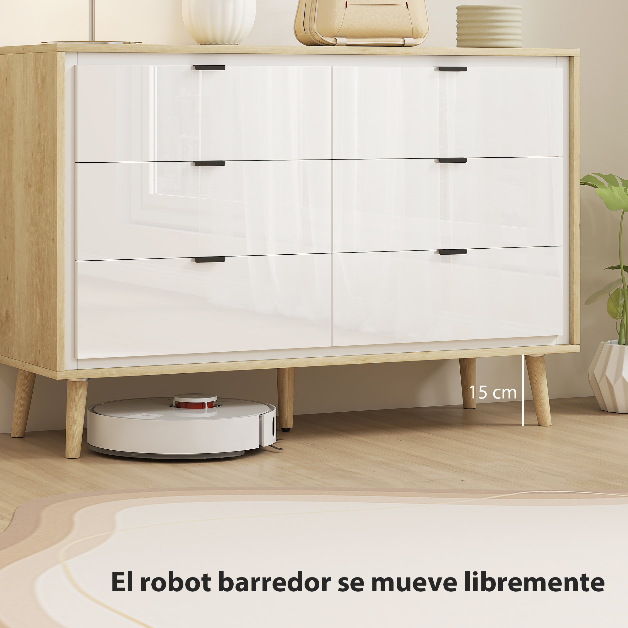 Un robot aspirador blanco limpia bajo un mueble de madera y blanco brillante. 15 cm de espacio.