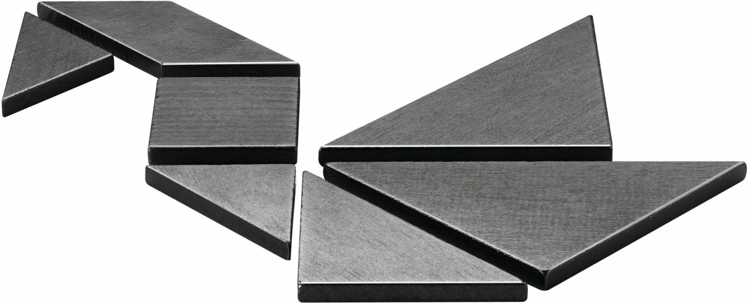Ciemnoszare kształty geometryczne ułożone we wzór.