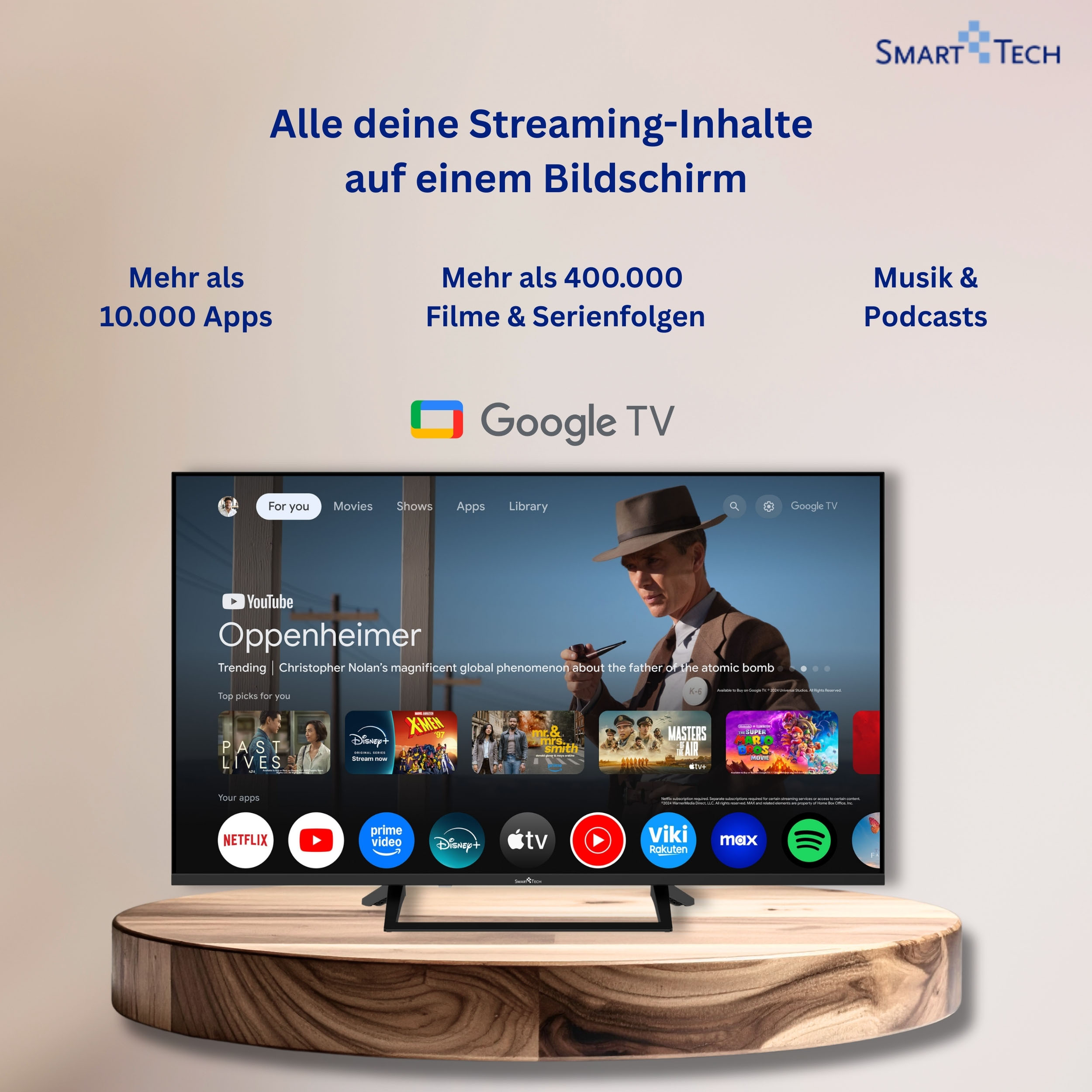 Un televisor muestra la interfaz de Google TV con apps como YouTube y Oppenheimer.