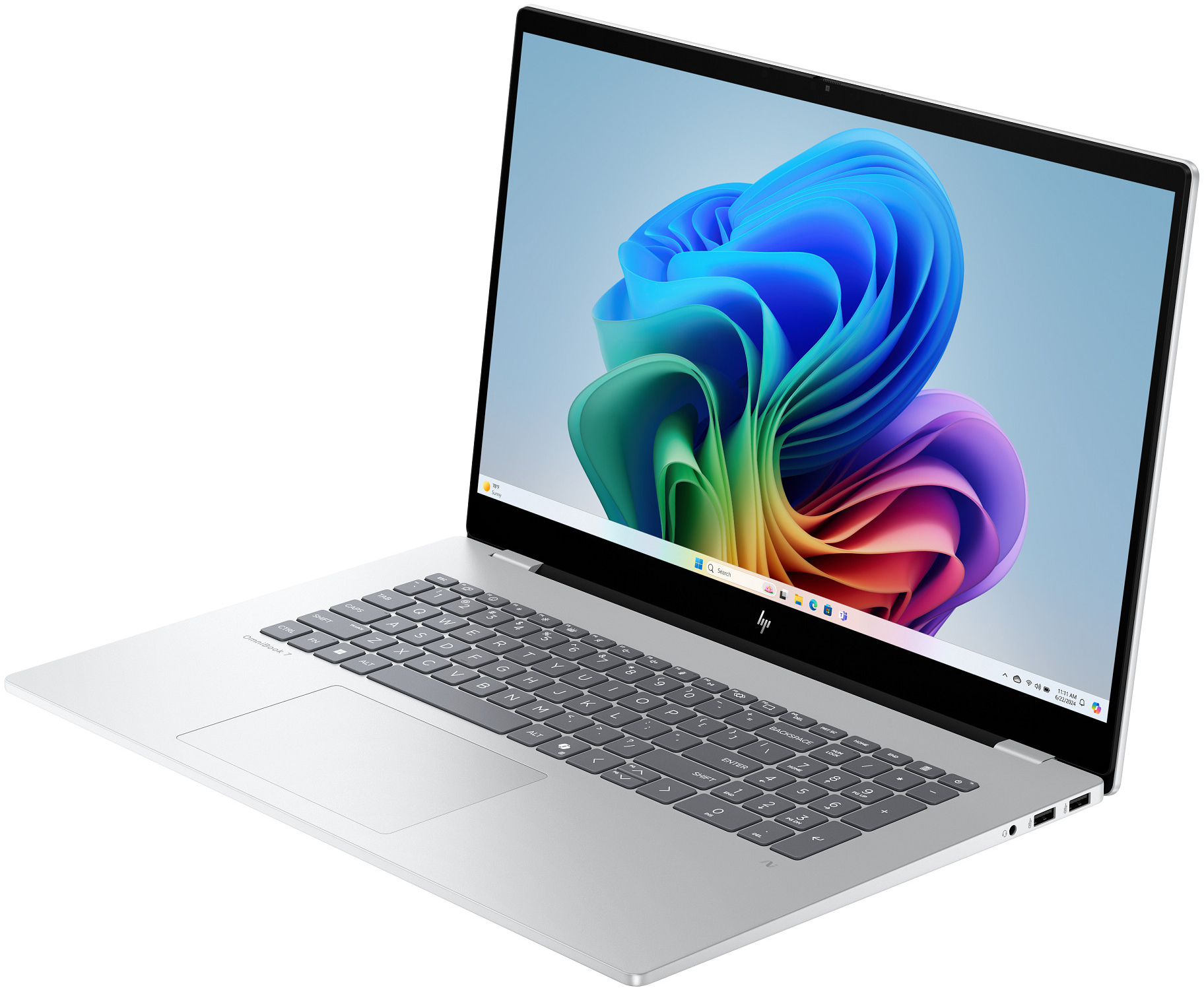 Ein silberner Laptop mit einem bunten Hintergrundbild auf dem Bildschirm.