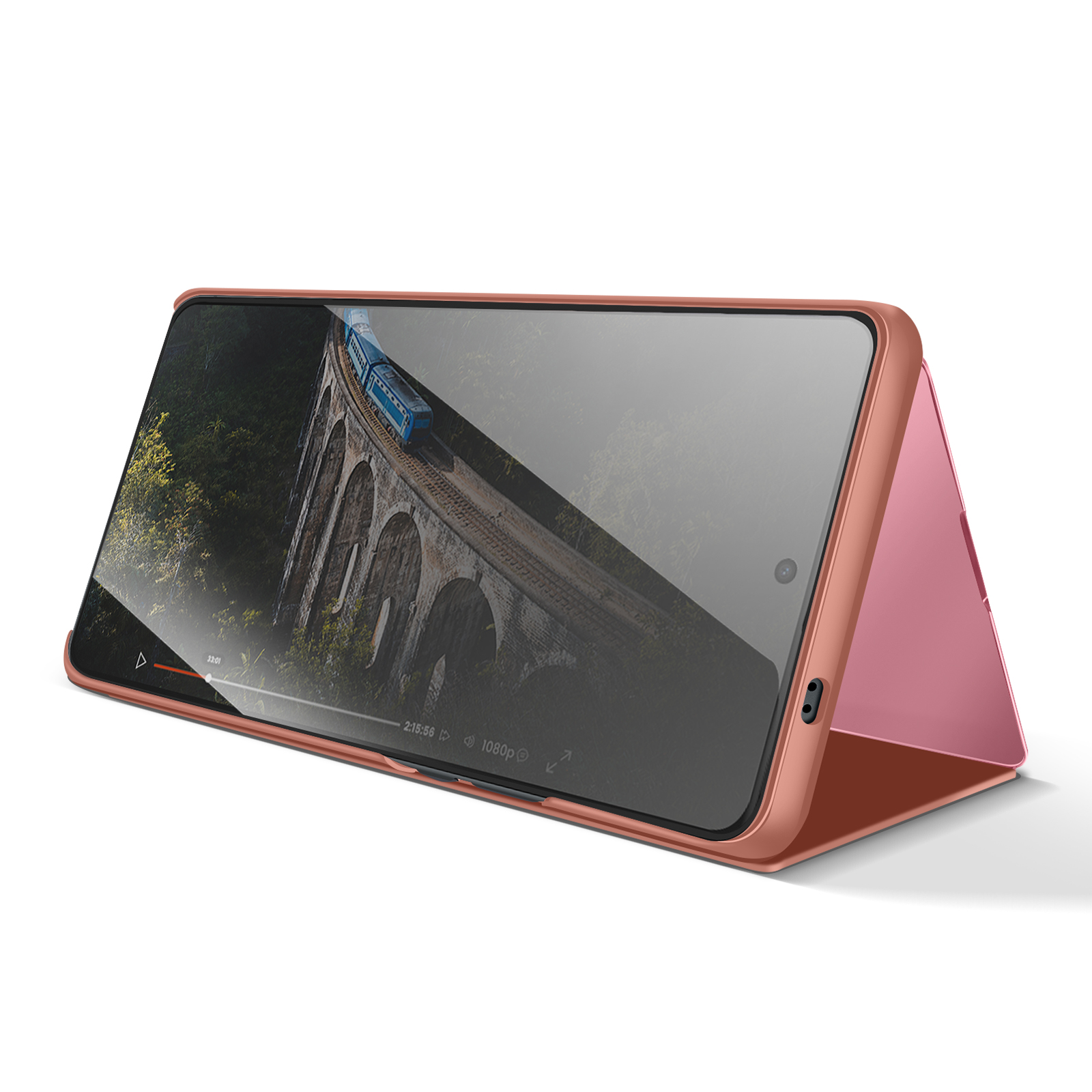 Un telefono color oro rosa poggia su una superficie bianca, mostrando un treno su un ponte sul suo schermo.