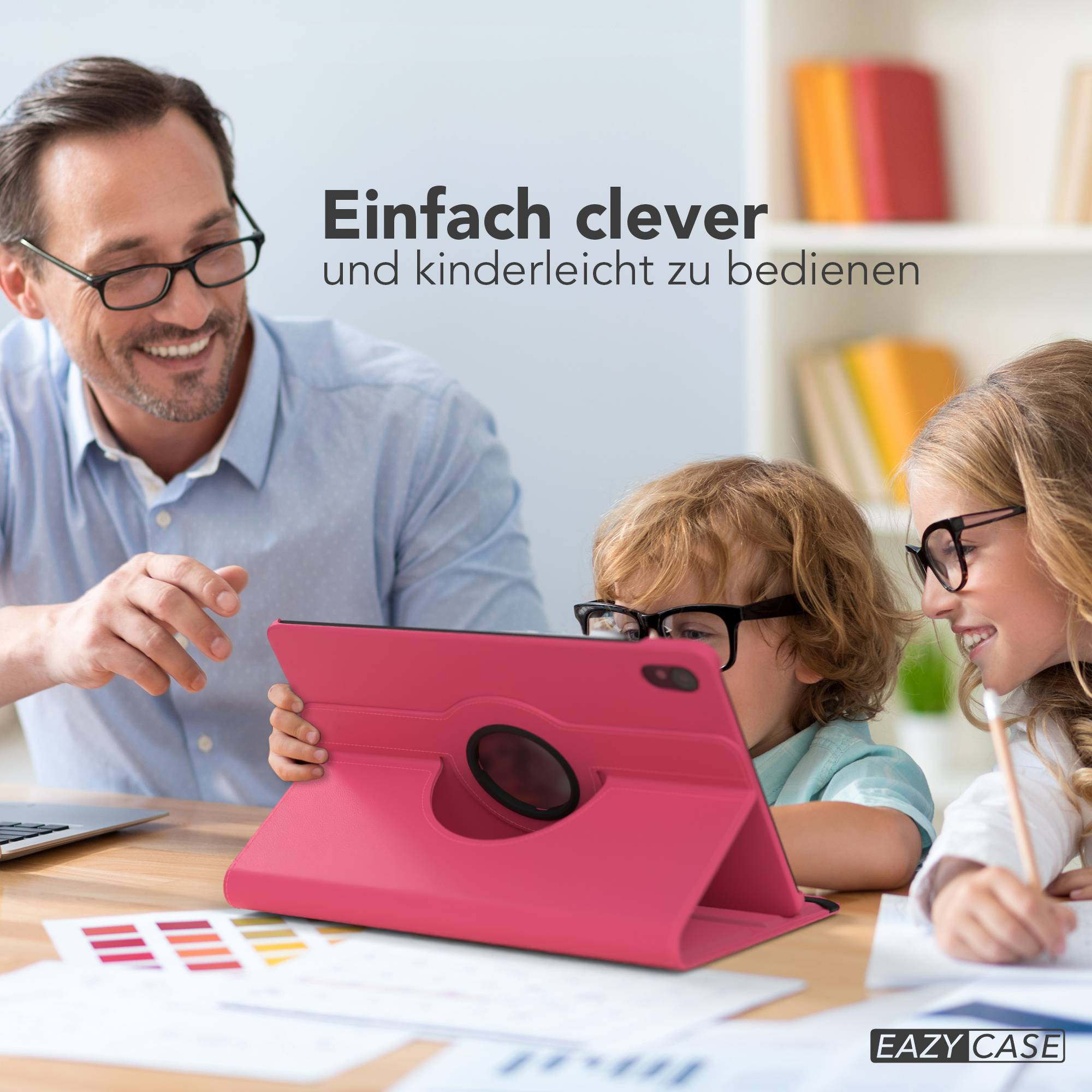 Mann mit Brille zeigt Kindern mit Brillen einen pinken Tablet-Ständer.