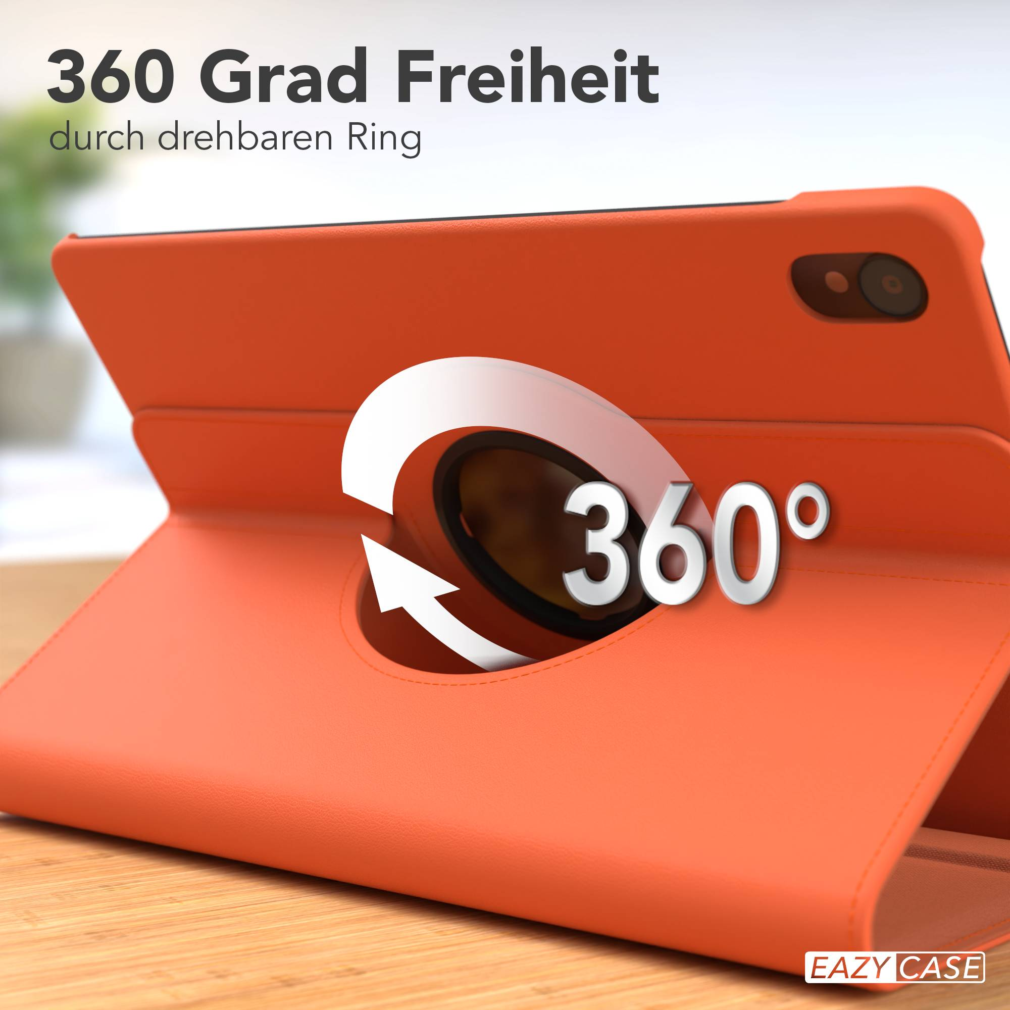 Orange Hülle mit 360-Grad-Drehring-Grafik und Text auf einem Holztisch.