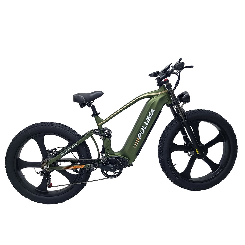 Grünes E-Bike mit breiten Reifen, Vollfederung und dem Schriftzug PULUMA.