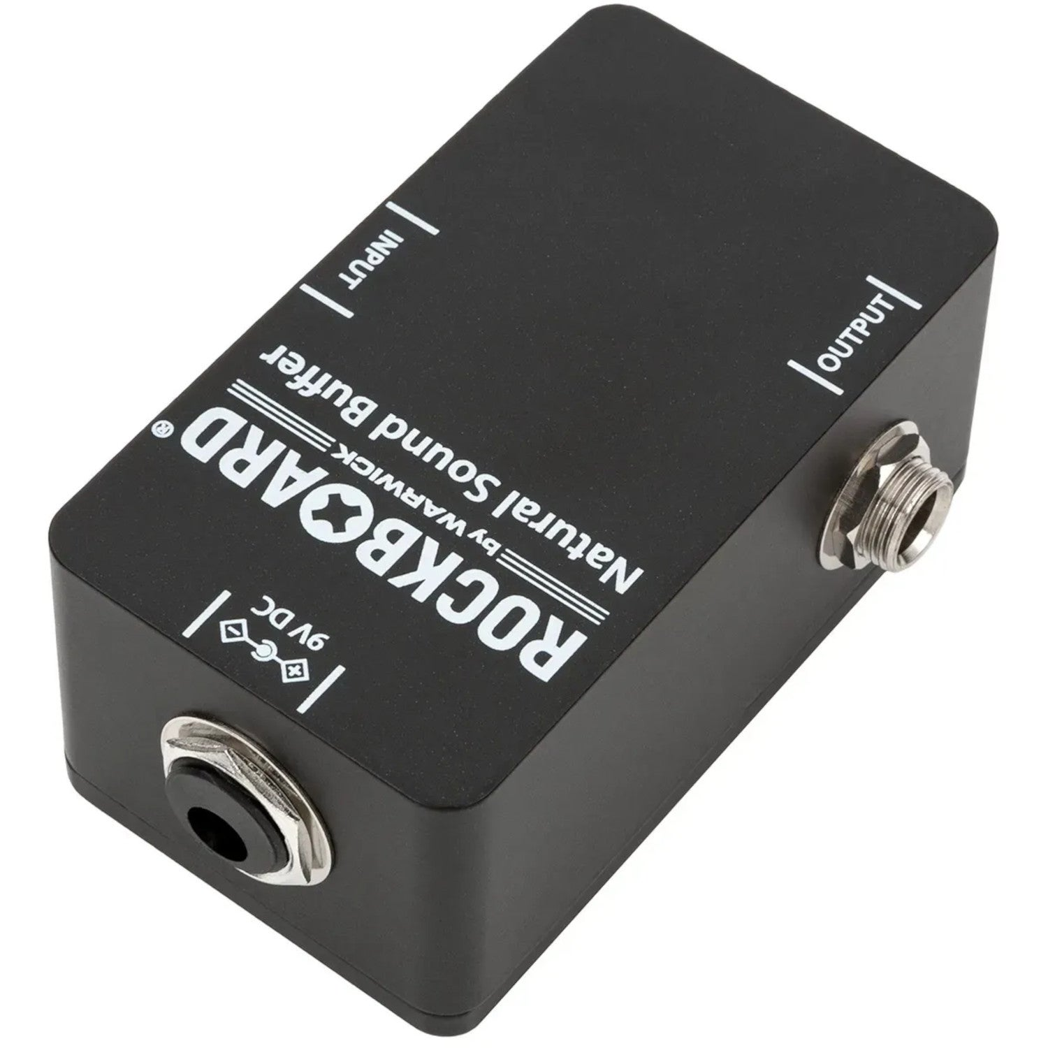 Black guitar effect pedal labeled Input, Output, and 9V DC. Made by Warwick.