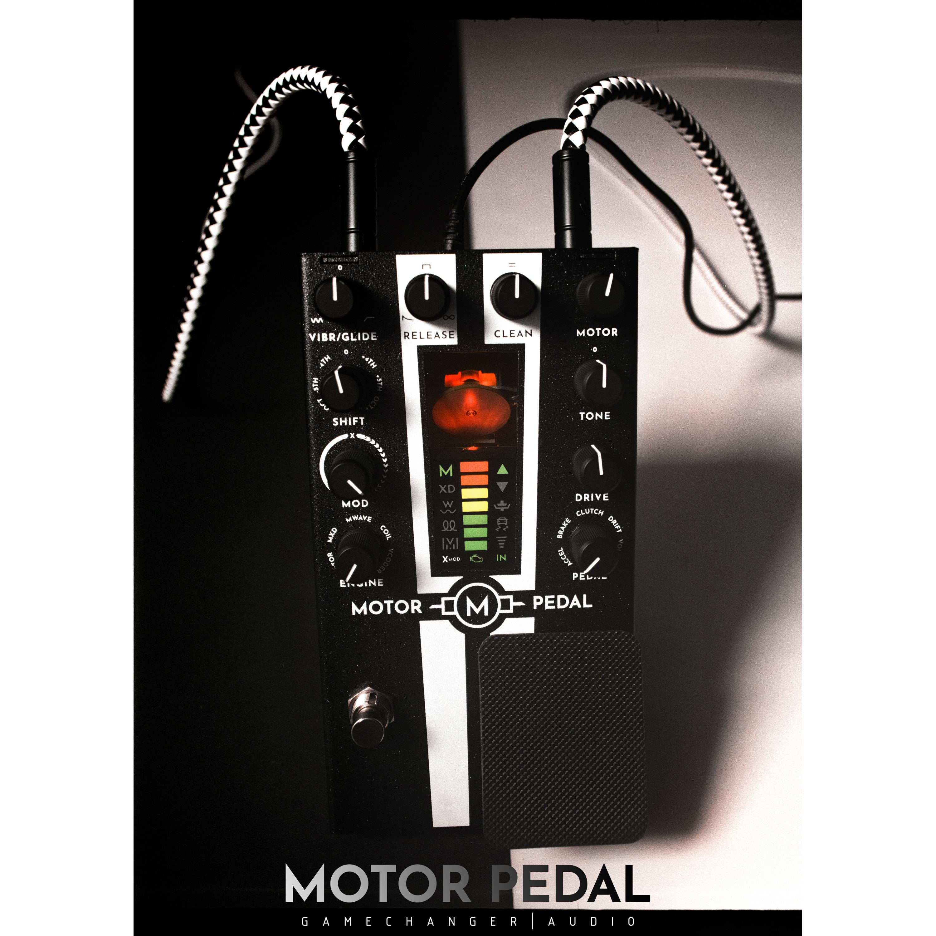 A black guitar effects pedal with knobs, switches, and an LED display.