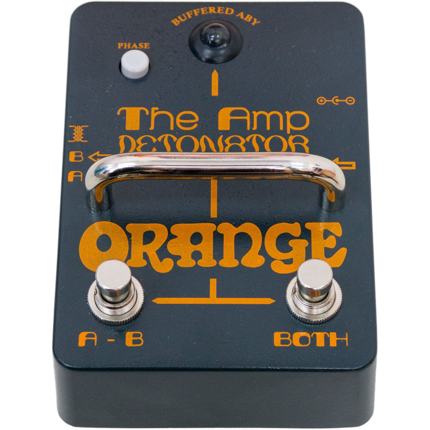 Een donkergrijs Orange Amp Detonator pedaal met een zilveren handvat en oranje tekst.