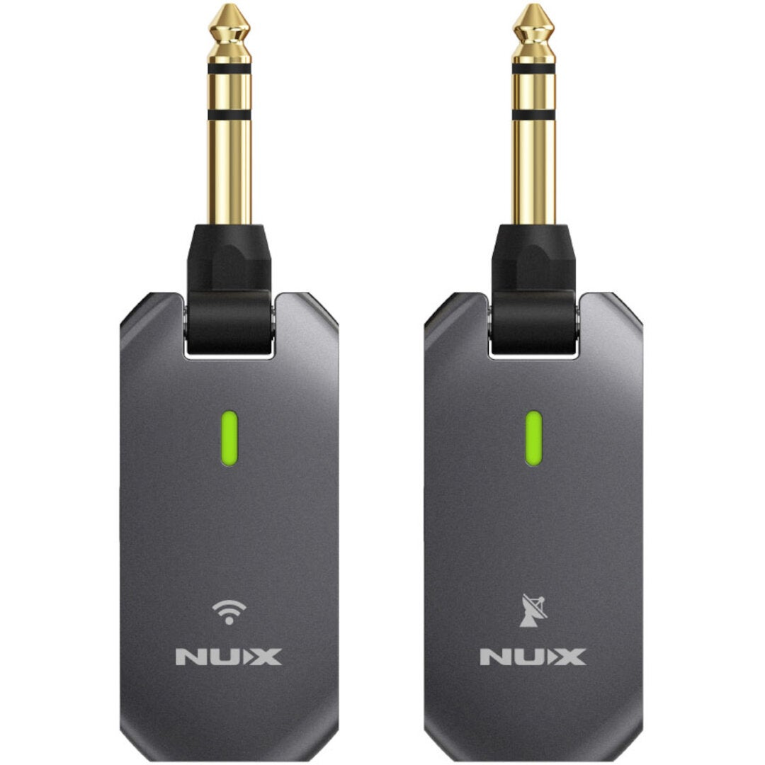 Twee grijze NUX draadloze gitaarzenders met gouden jacks en groene LED-lampjes.