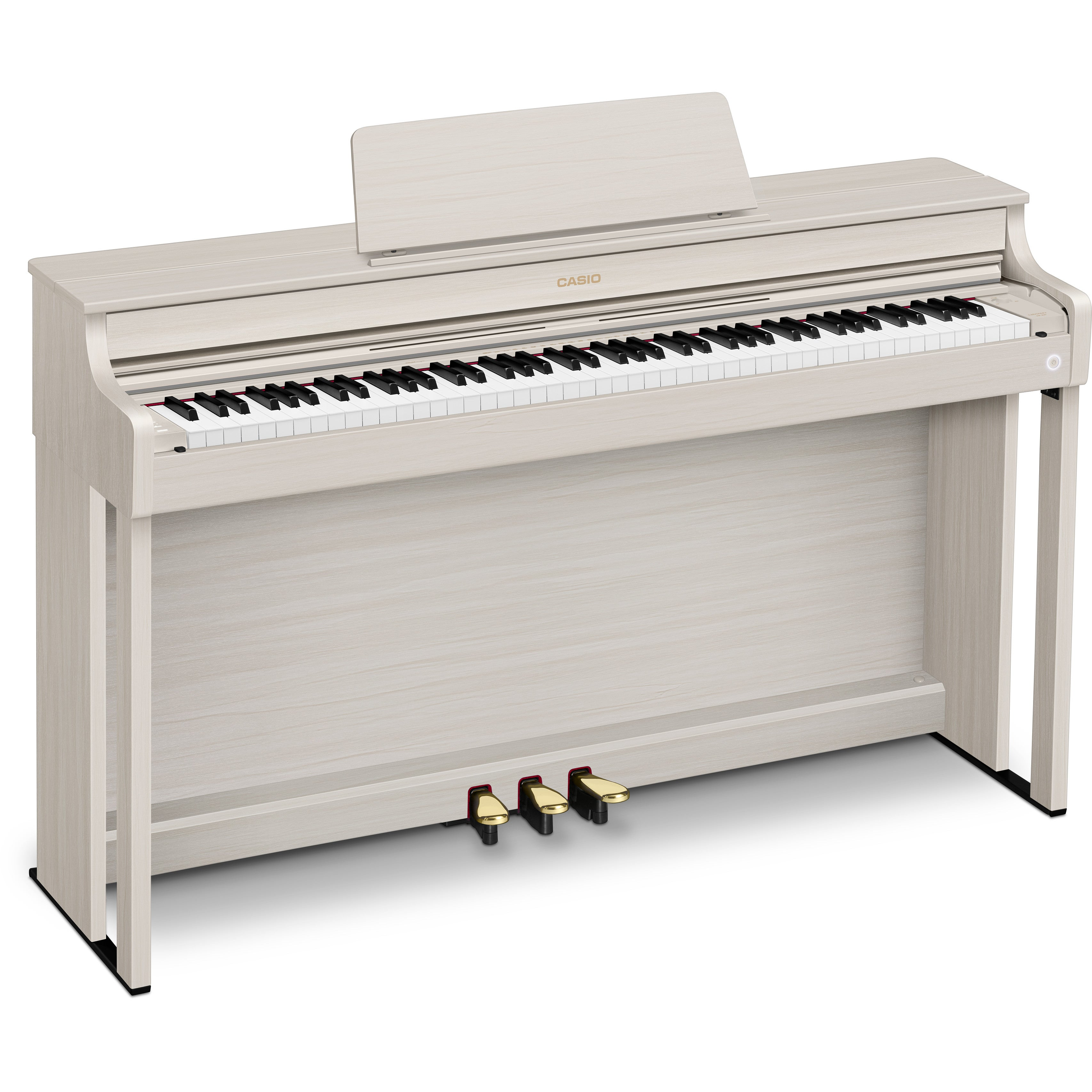Un piano numérique en bois clair avec pupitre, clavier et trois pédales.