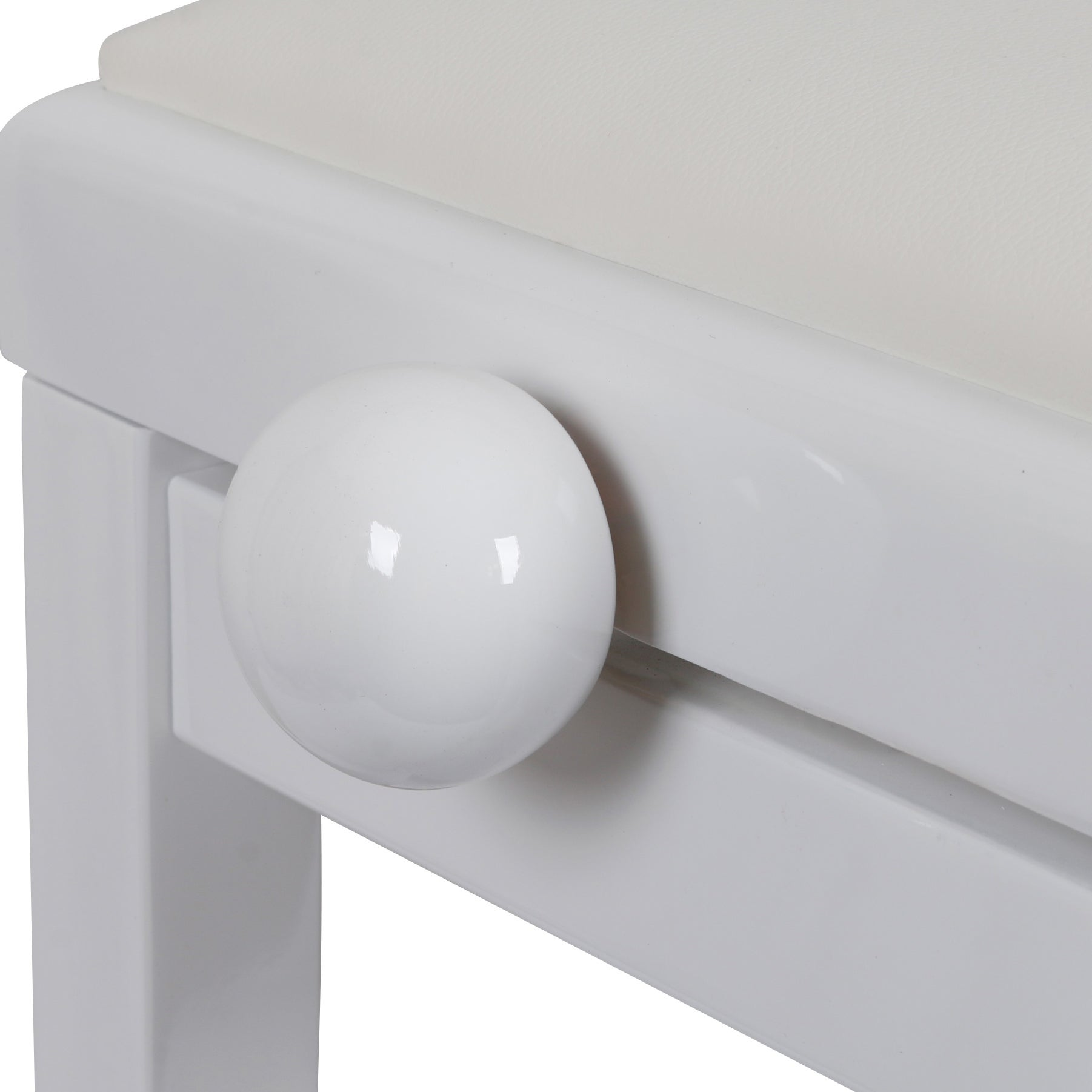 A white stool with a round knob and a padded seat.