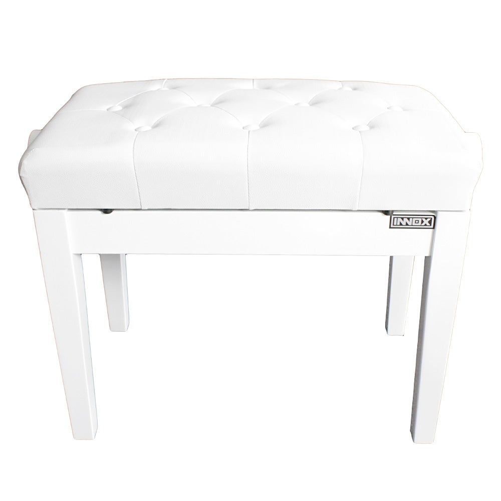 A white, tufted upholstered stool with four legs.