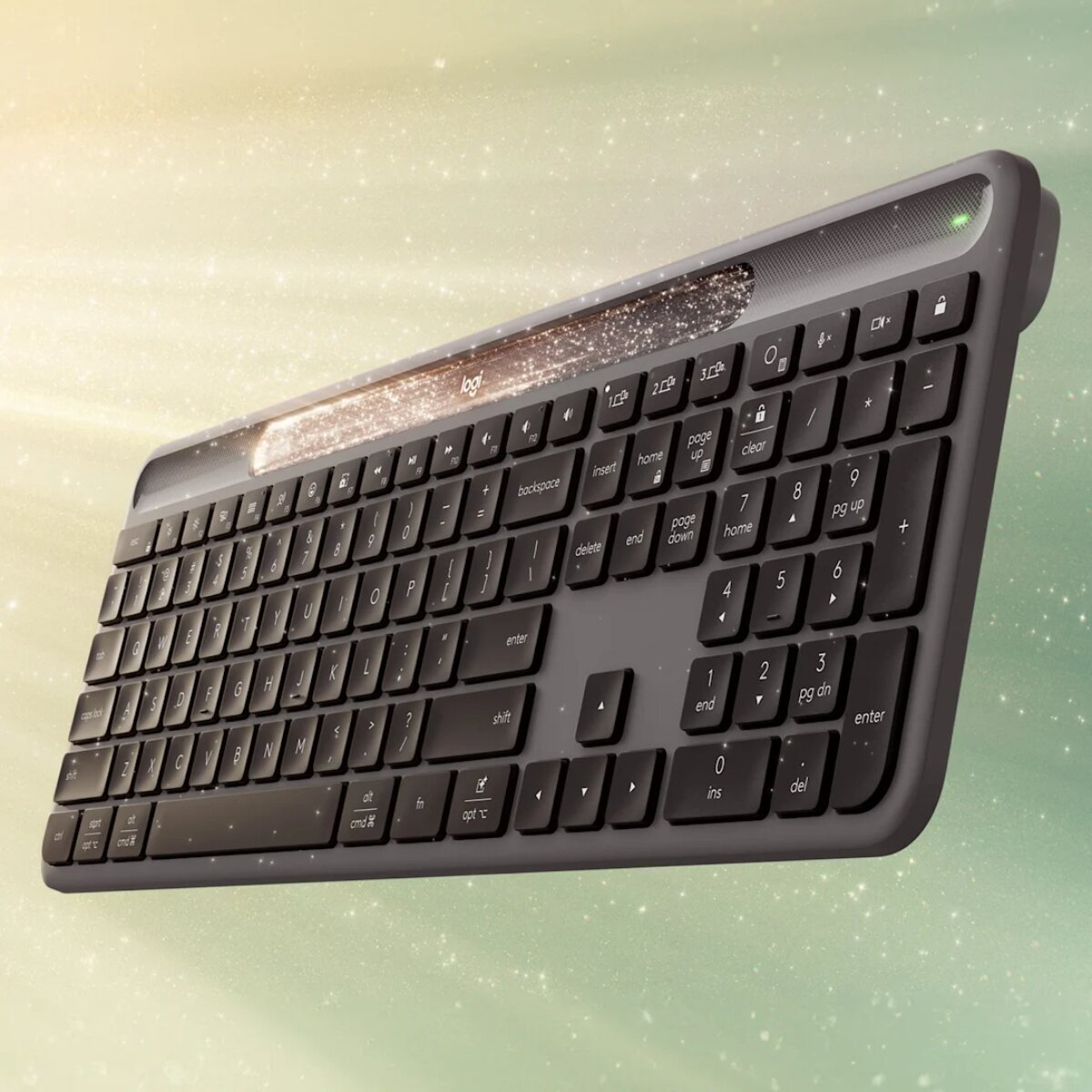 Una tastiera Logitech grigia con accenti illuminati su uno sfondo scintillante.