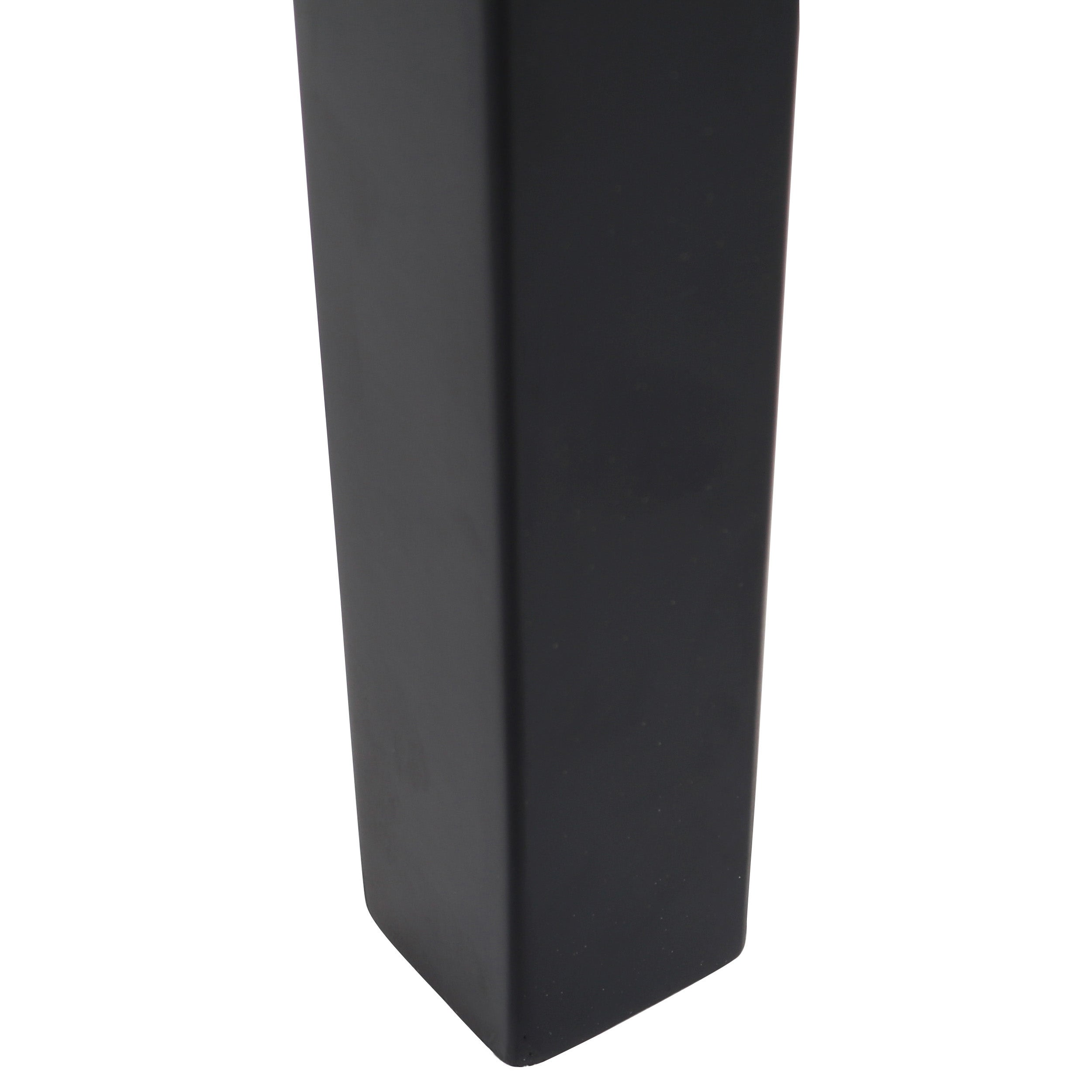 A black, rectangular object with rounded edges on a white background.