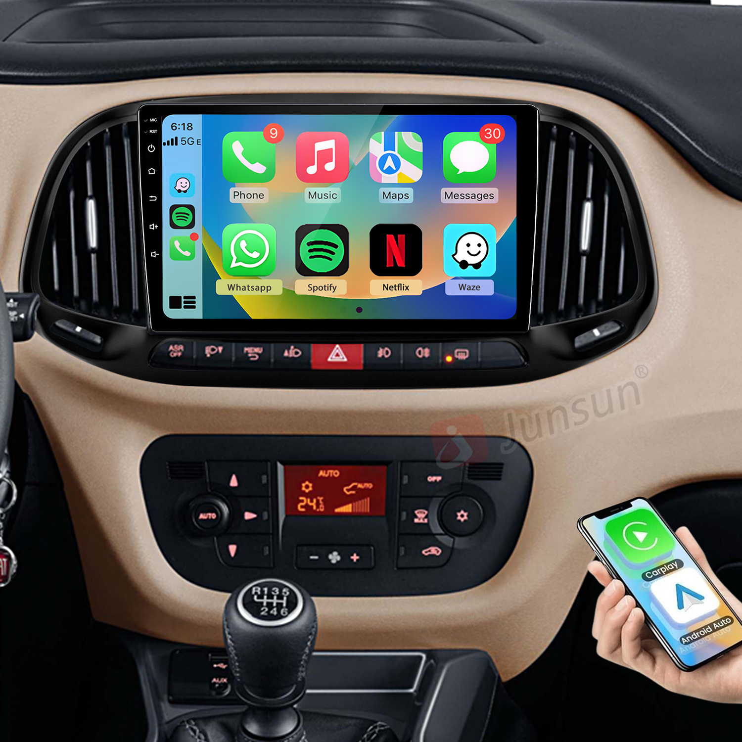 Armaturenbrett eines Autos mit einem Touchscreen-Infotainmentsystem, das Apps zeigt.