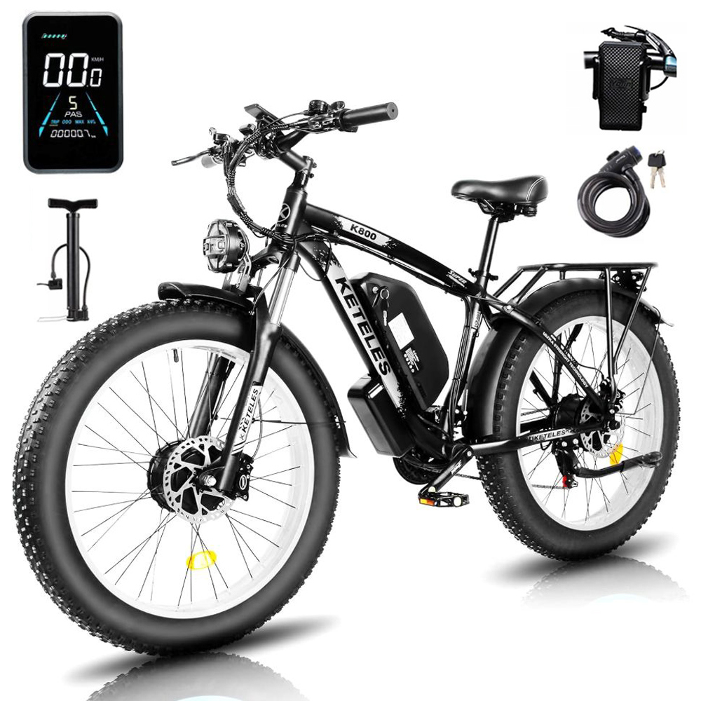 Bici elettrica nera con pneumatici grassi, display, pompa, lucchetto e cavo.