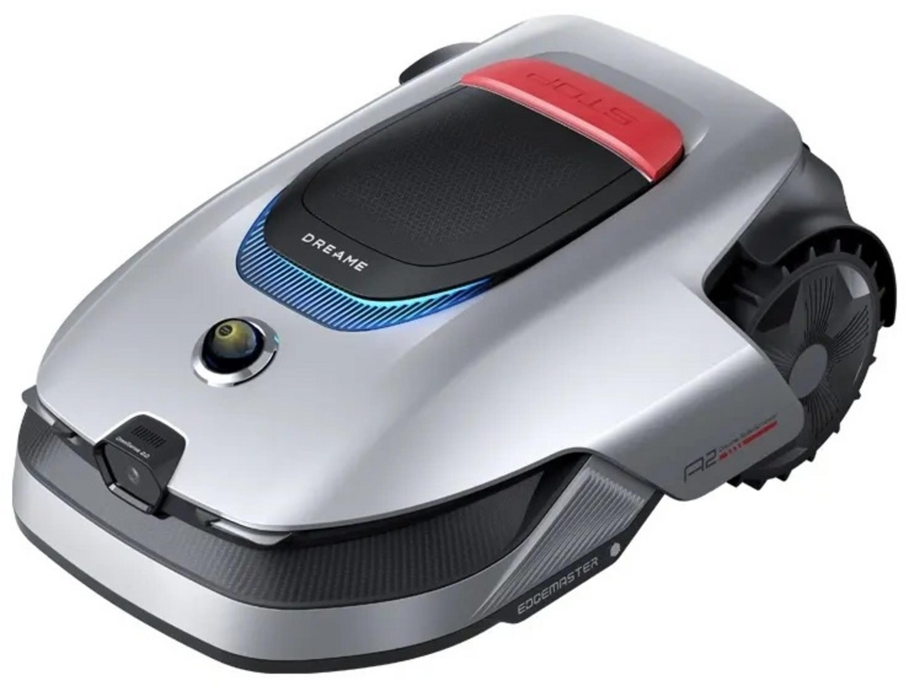 Srebrny robot koszący z czarnymi kołami i czerwonym przyciskiem stop.