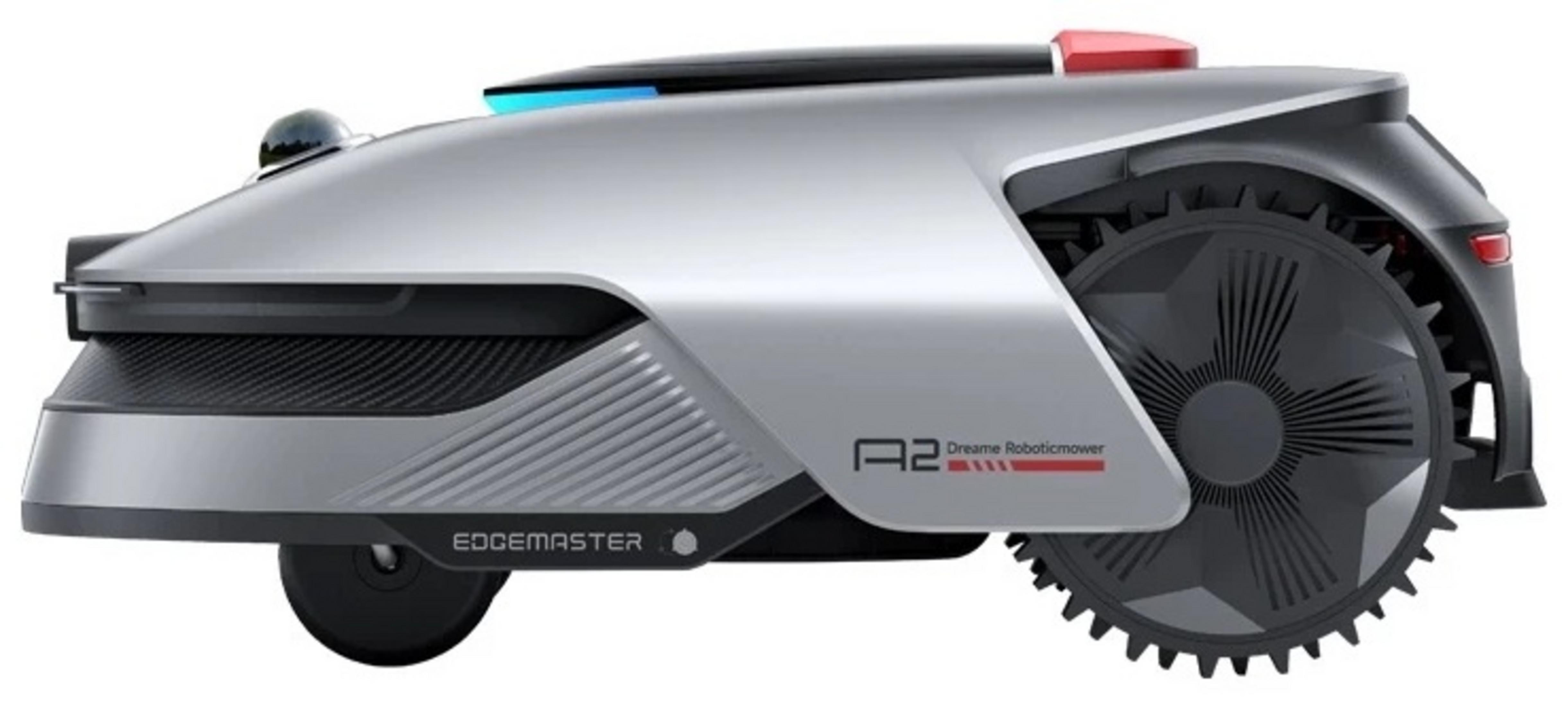 Srebrna kosiarka robotyczna z czarnymi kołami, niebieskimi i czerwonymi światłami na górze.