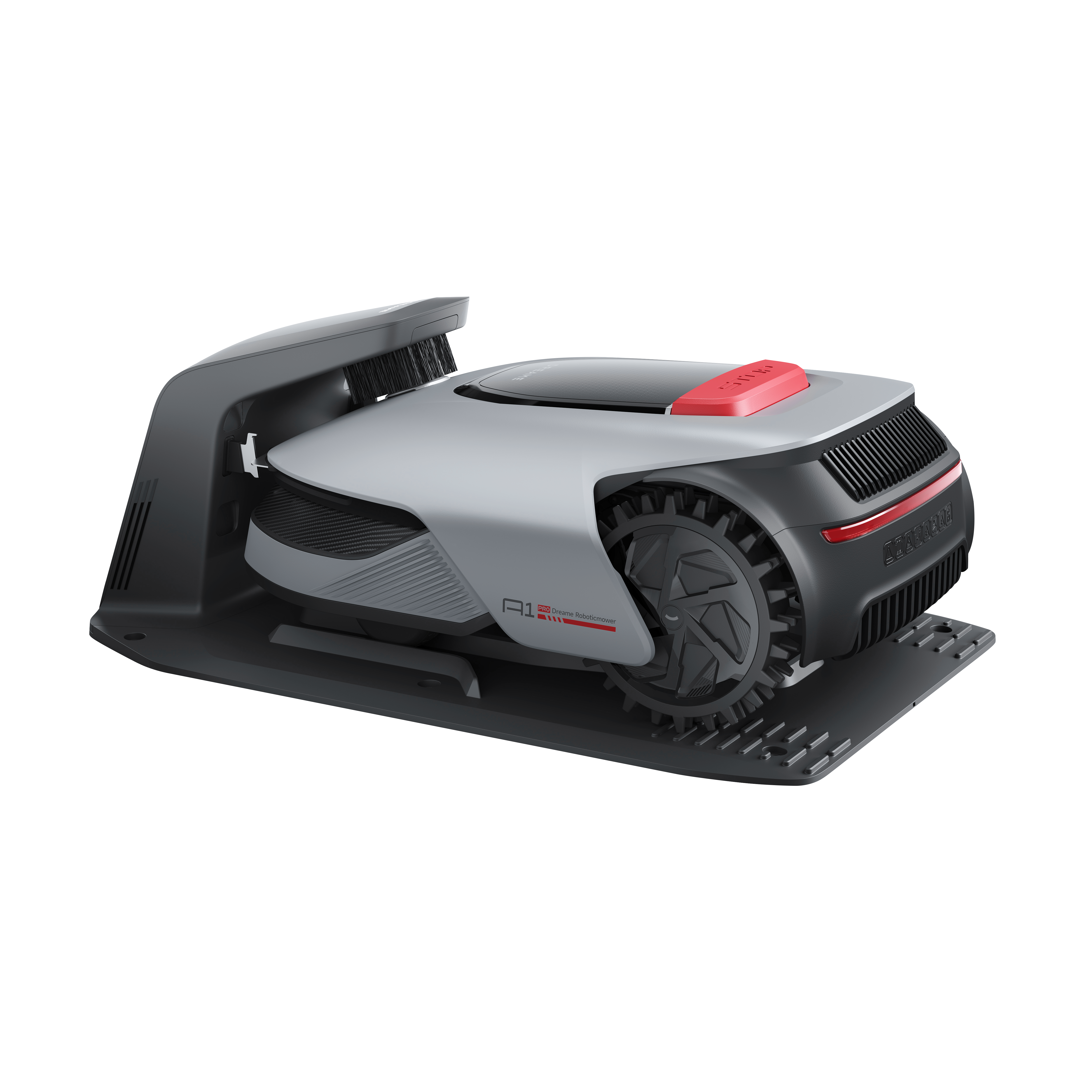 Szara kosiarka robotyczna z czerwonymi akcentami na czarnej podstawie.