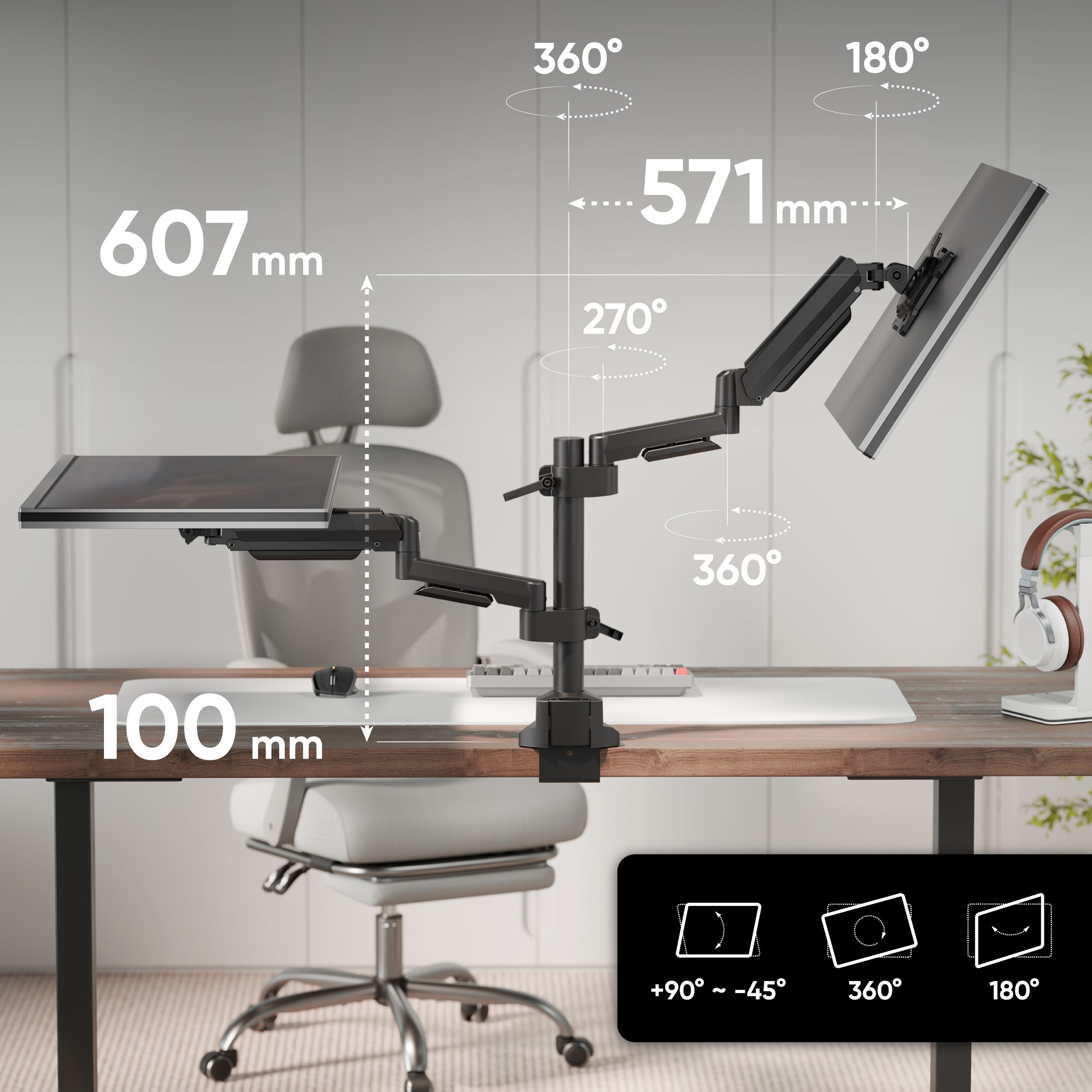 Czarny wysięgnik do monitora z tacą na laptopa na biurku.