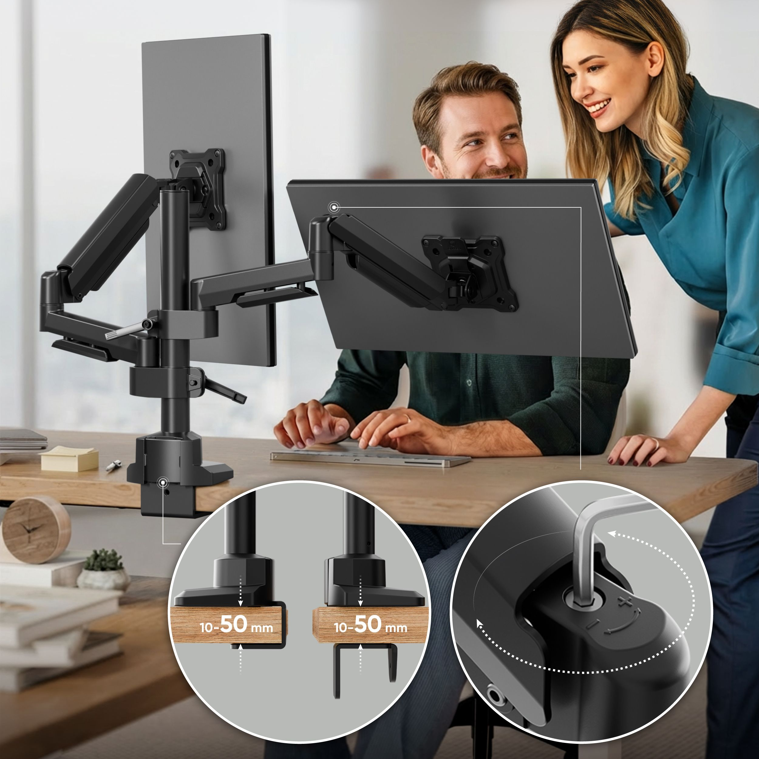 Para przy biurku z dwoma monitorami zamontowanymi na ramieniu obrotowym.