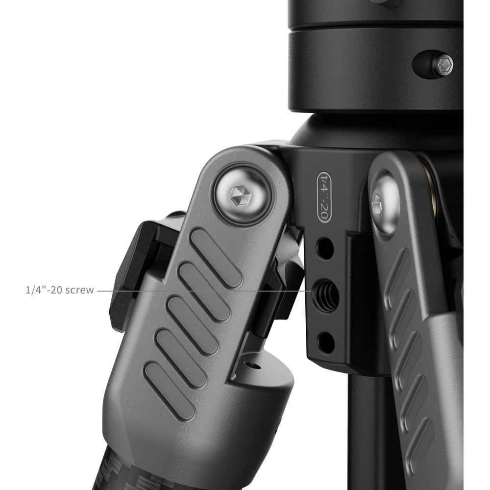 Gros plan d'une articulation de jambe de trépied grise avec filetage 1/4"-20.