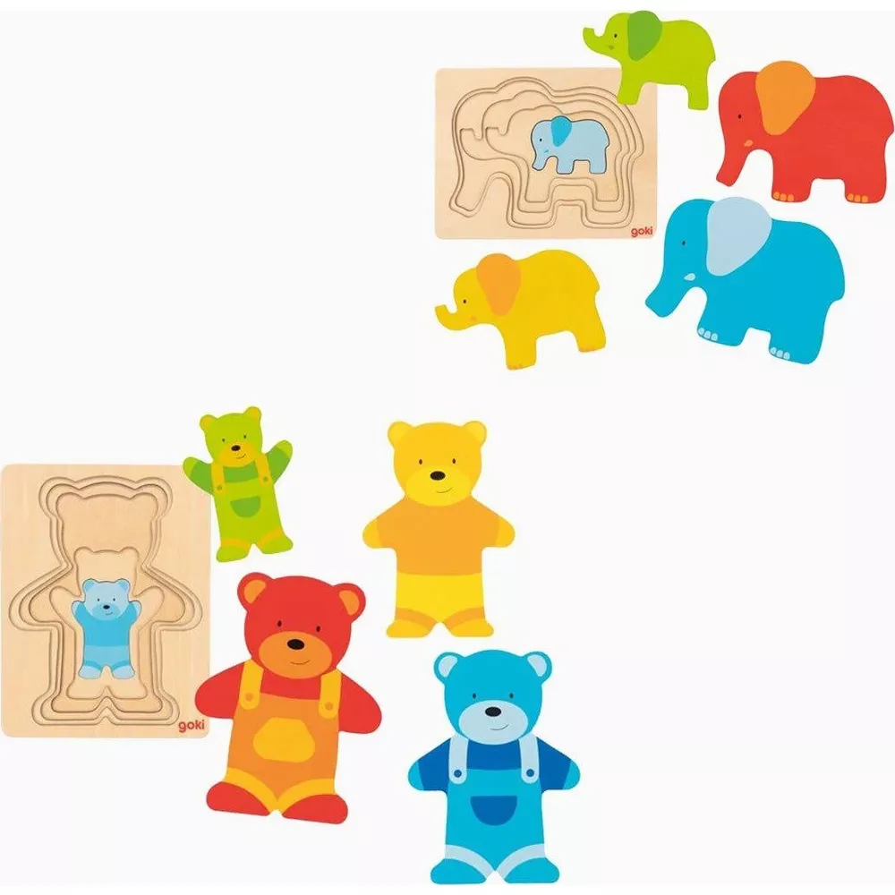 Bunte Holz-Puzzles von Elefanten und Bären auf weißem Hintergrund.