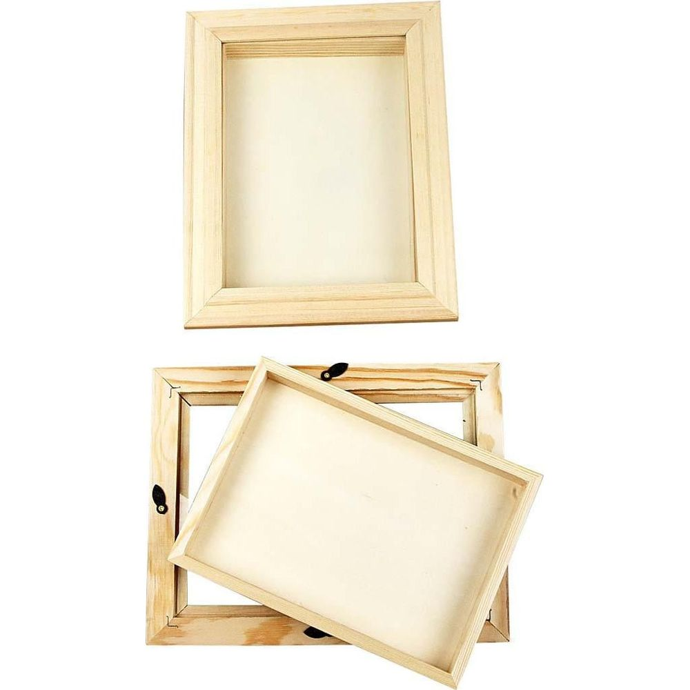 Deux cadres de toile en bois avec des toiles beige clair sur fond blanc.