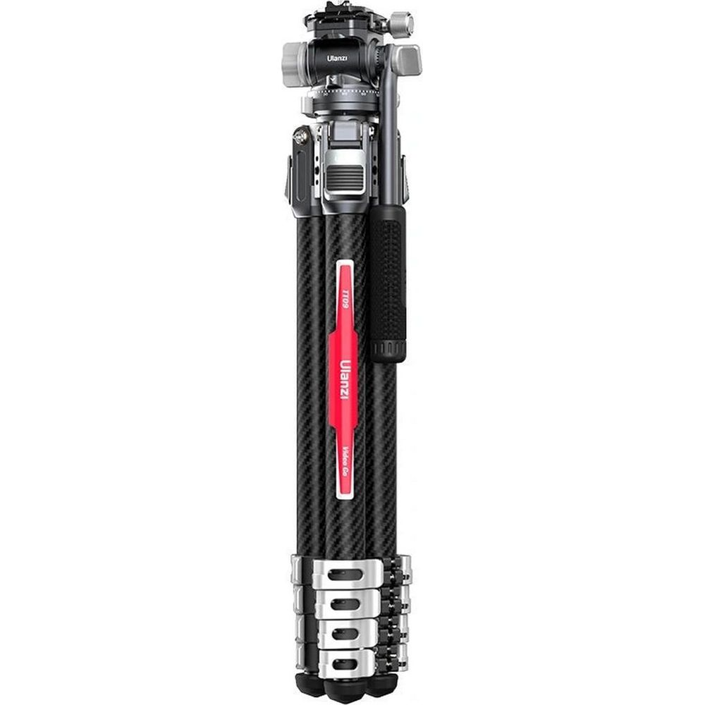Un trépied pliable en fibre de carbone noir avec des ferrures argentées et une poignée rouge.