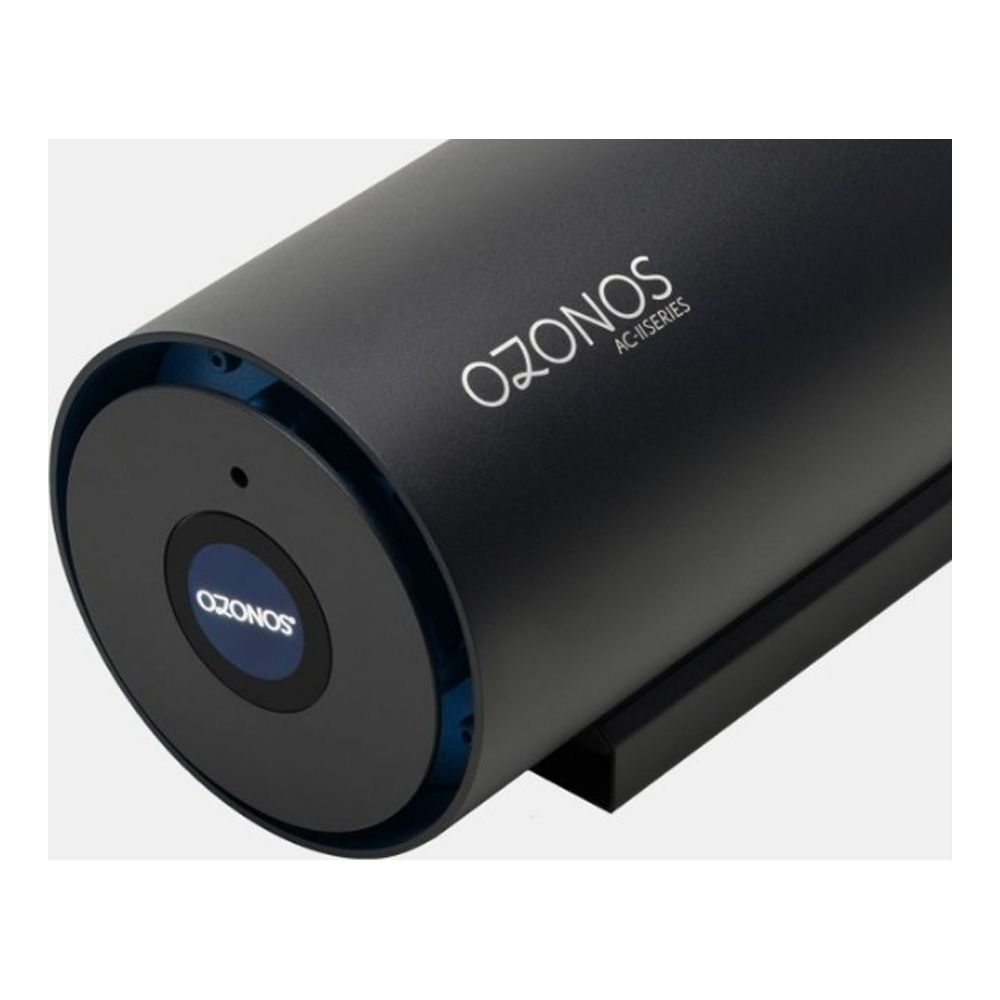 Un purificateur d'air Ozonos cylindrique noir avec un anneau et un logo bleus.