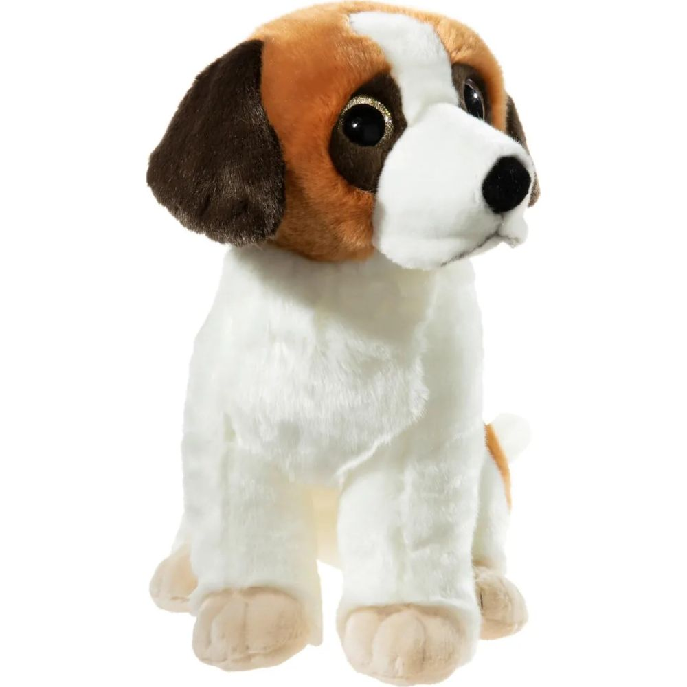 Ein Plüschhund sitzt, weiß mit braunen und schwarzen Flecken.