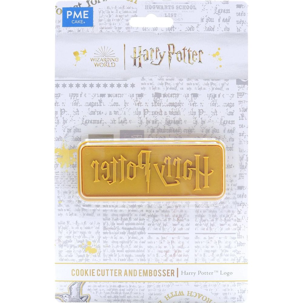 Un emporte-pièce et moule doré du logo Harry Potter.