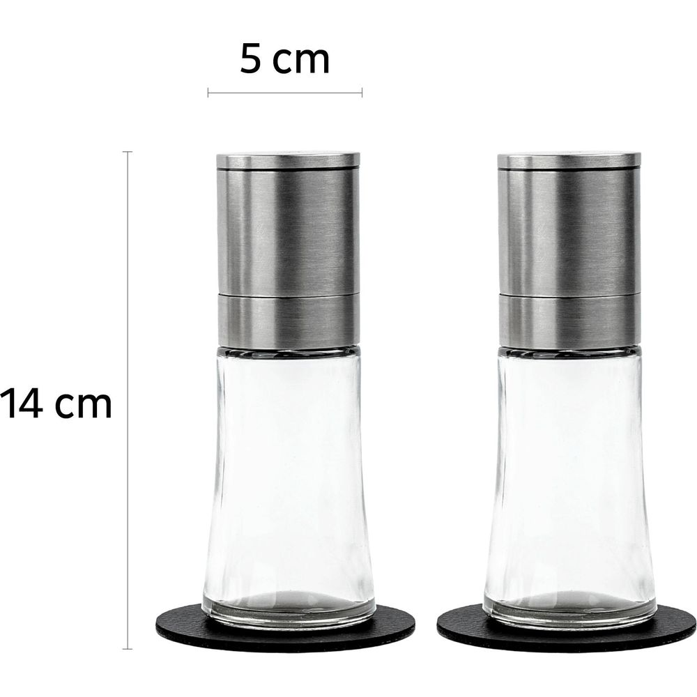 Zwei Glasmühlen mit Edelstahl-Oberteil, 14 cm hoch, 5 cm breit.